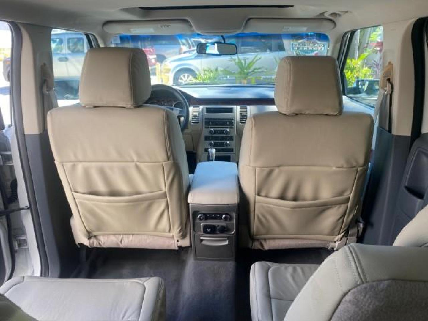 2009 White Suede /Medium Light Stone Ford Flex Limited LEATHER SUNROOF (2FMDK53C99B) with an 3.5L V6 Duratec Engine engine, Automatic transmission, located at 4701 North Dixie Hwy, Pompano Beach, FL, 33064, (954) 422-2889, 26.240938, -80.123474 - OUR WEBPAGE FLORIDACARS1.COM HAS OVER 100 PHOTOS AND FREE CARFAX LINK 2009 FORD FLEX VIN: 2FMDK53C99BA12573 4 DOOR LIMITED FWD 3.5L V6 DURATEC ENGINE GASOLINE FRONT WHEEL DRIVE Highlighted Features Bed Liner Cloth Seats ABS Brakes Automatic Transmission Power Locks AM/FM Stereo CD Audio Power Mirror - Photo#65