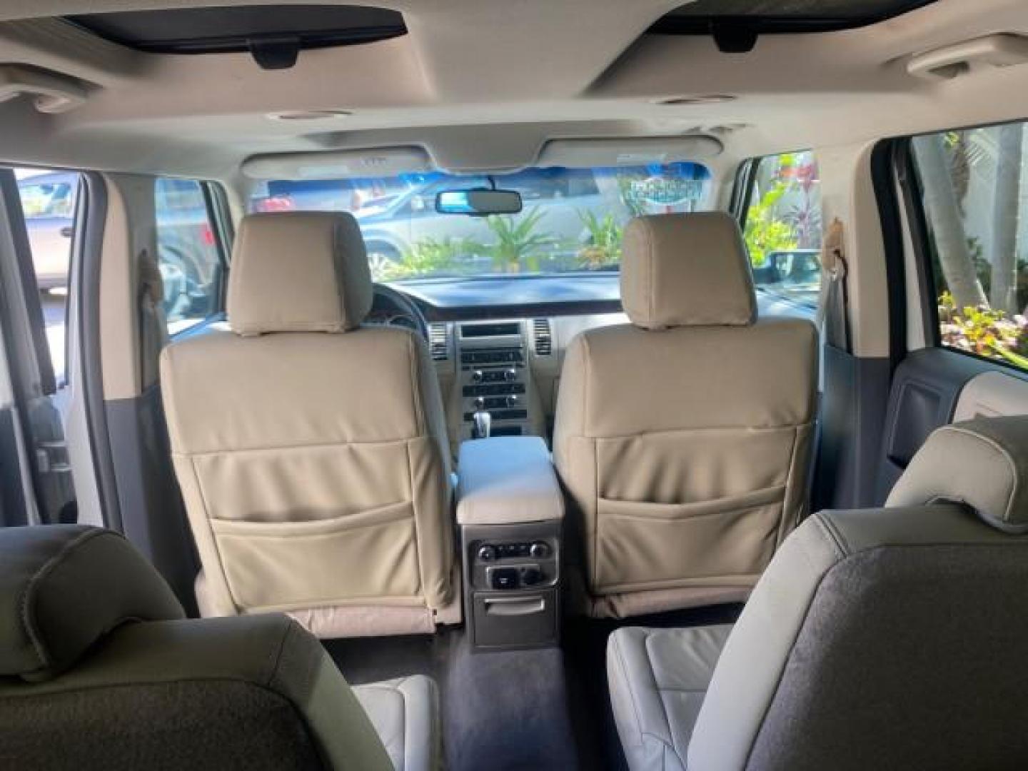 2009 White Suede /Medium Light Stone Ford Flex Limited LEATHER SUNROOF (2FMDK53C99B) with an 3.5L V6 Duratec Engine engine, Automatic transmission, located at 4701 North Dixie Hwy, Pompano Beach, FL, 33064, (954) 422-2889, 26.240938, -80.123474 - OUR WEBPAGE FLORIDACARS1.COM HAS OVER 100 PHOTOS AND FREE CARFAX LINK 2009 FORD FLEX VIN: 2FMDK53C99BA12573 4 DOOR LIMITED FWD 3.5L V6 DURATEC ENGINE GASOLINE FRONT WHEEL DRIVE Highlighted Features Bed Liner Cloth Seats ABS Brakes Automatic Transmission Power Locks AM/FM Stereo CD Audio Power Mirror - Photo#70