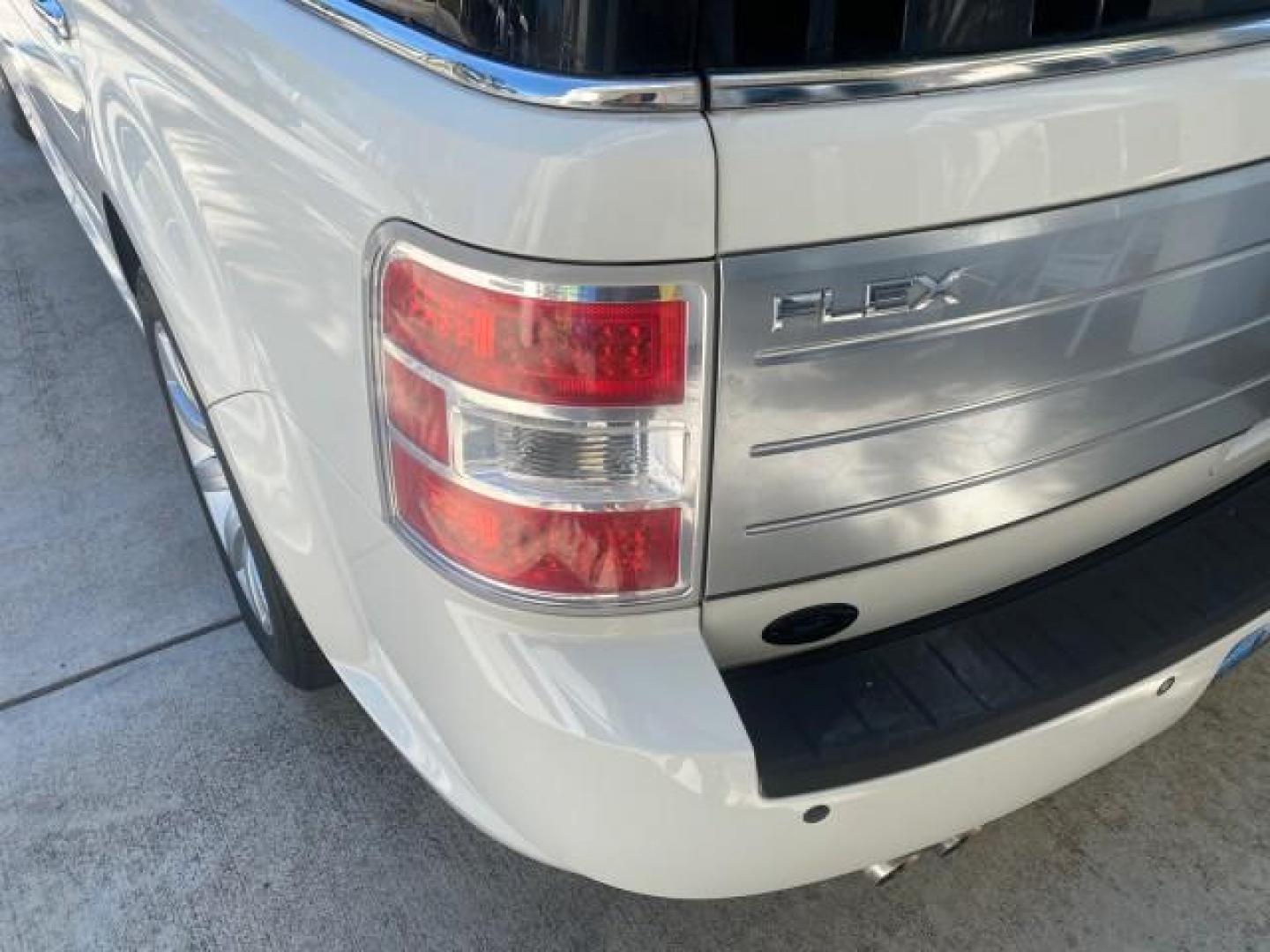 2009 White Suede /Medium Light Stone Ford Flex Limited LEATHER SUNROOF (2FMDK53C99B) with an 3.5L V6 Duratec Engine engine, Automatic transmission, located at 4701 North Dixie Hwy, Pompano Beach, FL, 33064, (954) 422-2889, 26.240938, -80.123474 - OUR WEBPAGE FLORIDACARS1.COM HAS OVER 100 PHOTOS AND FREE CARFAX LINK 2009 FORD FLEX VIN: 2FMDK53C99BA12573 4 DOOR LIMITED FWD 3.5L V6 DURATEC ENGINE GASOLINE FRONT WHEEL DRIVE Highlighted Features Bed Liner Cloth Seats ABS Brakes Automatic Transmission Power Locks AM/FM Stereo CD Audio Power Mirror - Photo#73
