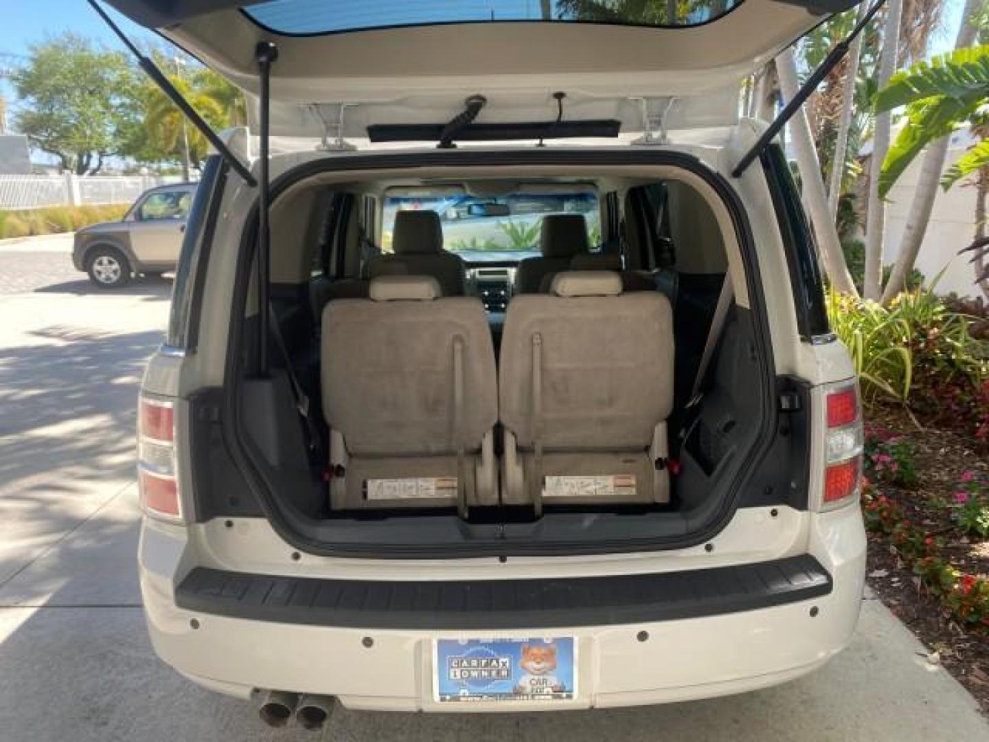 2009 White Suede /Medium Light Stone Ford Flex Limited LEATHER SUNROOF (2FMDK53C99B) with an 3.5L V6 Duratec Engine engine, Automatic transmission, located at 4701 North Dixie Hwy, Pompano Beach, FL, 33064, (954) 422-2889, 26.240938, -80.123474 - OUR WEBPAGE FLORIDACARS1.COM HAS OVER 100 PHOTOS AND FREE CARFAX LINK 2009 FORD FLEX VIN: 2FMDK53C99BA12573 4 DOOR LIMITED FWD 3.5L V6 DURATEC ENGINE GASOLINE FRONT WHEEL DRIVE Highlighted Features Bed Liner Cloth Seats ABS Brakes Automatic Transmission Power Locks AM/FM Stereo CD Audio Power Mirror - Photo#78