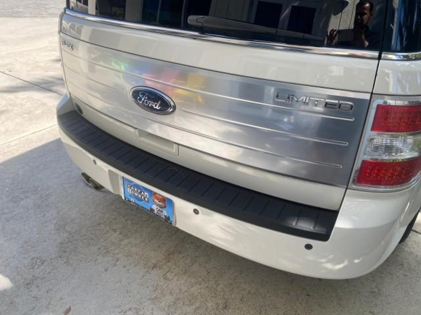 2009 White Suede /Medium Light Stone Ford Flex Limited LEATHER SUNROOF (2FMDK53C99B) with an 3.5L V6 Duratec Engine engine, Automatic transmission, located at 4701 North Dixie Hwy, Pompano Beach, FL, 33064, (954) 422-2889, 26.240938, -80.123474 - OUR WEBPAGE FLORIDACARS1.COM HAS OVER 100 PHOTOS AND FREE CARFAX LINK 2009 FORD FLEX VIN: 2FMDK53C99BA12573 4 DOOR LIMITED FWD 3.5L V6 DURATEC ENGINE GASOLINE FRONT WHEEL DRIVE Highlighted Features Bed Liner Cloth Seats ABS Brakes Automatic Transmission Power Locks AM/FM Stereo CD Audio Power Mirror - Photo#79