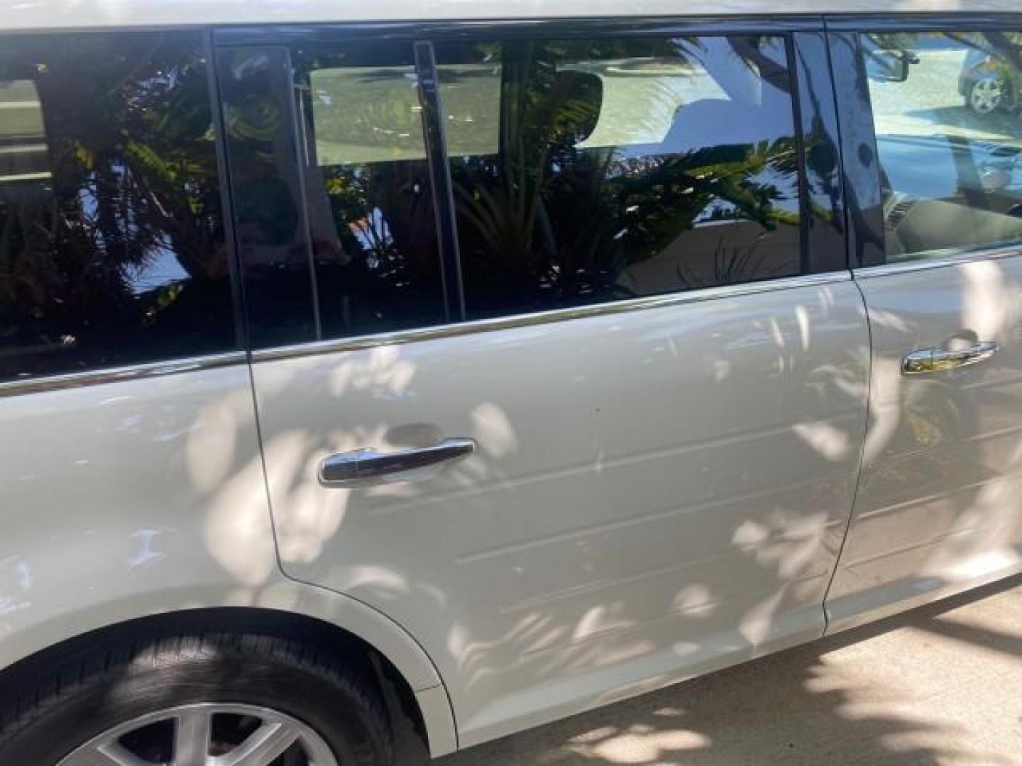 2009 White Suede /Medium Light Stone Ford Flex Limited LEATHER SUNROOF (2FMDK53C99B) with an 3.5L V6 Duratec Engine engine, Automatic transmission, located at 4701 North Dixie Hwy, Pompano Beach, FL, 33064, (954) 422-2889, 26.240938, -80.123474 - OUR WEBPAGE FLORIDACARS1.COM HAS OVER 100 PHOTOS AND FREE CARFAX LINK 2009 FORD FLEX VIN: 2FMDK53C99BA12573 4 DOOR LIMITED FWD 3.5L V6 DURATEC ENGINE GASOLINE FRONT WHEEL DRIVE Highlighted Features Bed Liner Cloth Seats ABS Brakes Automatic Transmission Power Locks AM/FM Stereo CD Audio Power Mirror - Photo#85