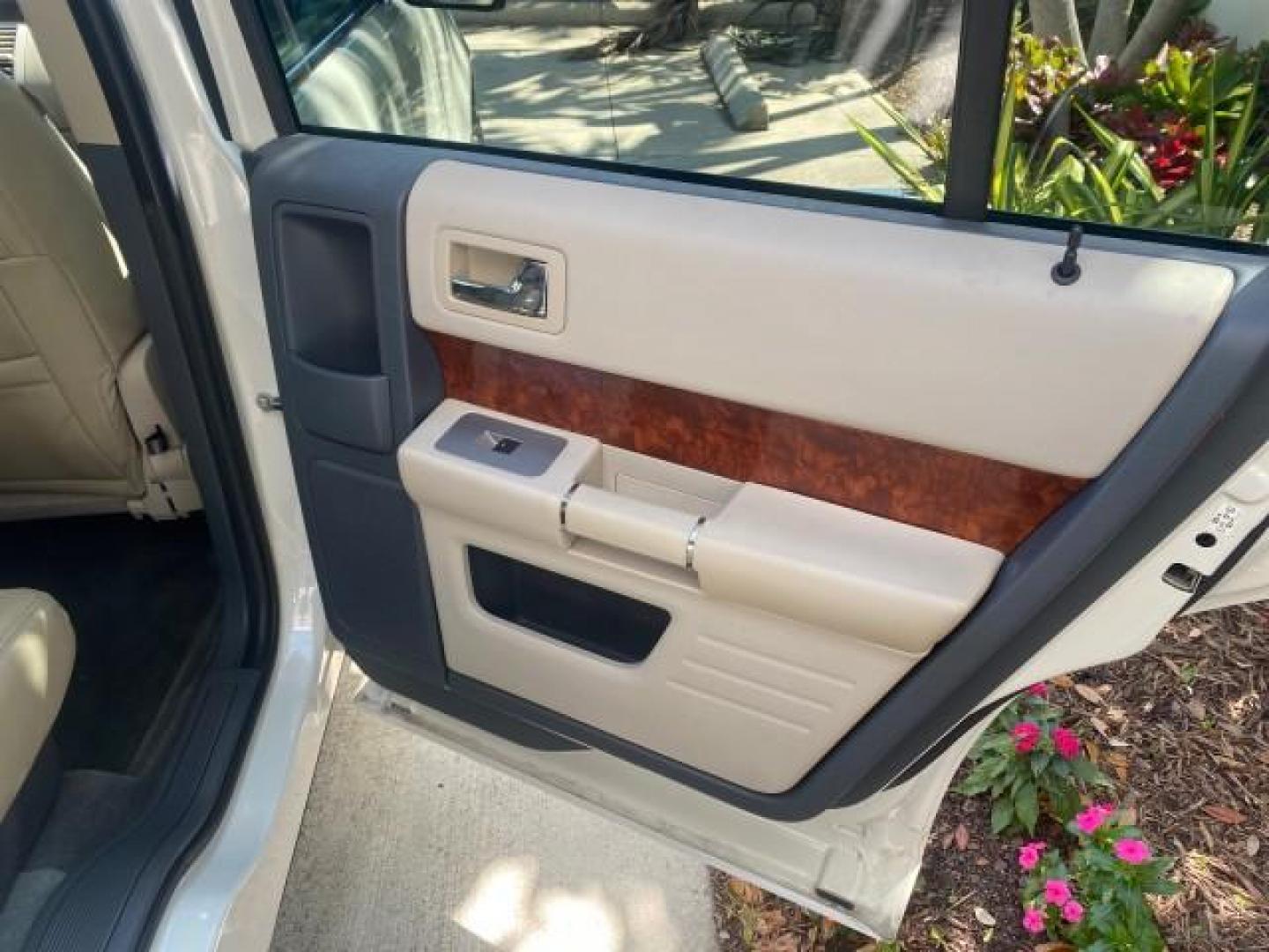 2009 White Suede /Medium Light Stone Ford Flex Limited LEATHER SUNROOF (2FMDK53C99B) with an 3.5L V6 Duratec Engine engine, Automatic transmission, located at 4701 North Dixie Hwy, Pompano Beach, FL, 33064, (954) 422-2889, 26.240938, -80.123474 - OUR WEBPAGE FLORIDACARS1.COM HAS OVER 100 PHOTOS AND FREE CARFAX LINK 2009 FORD FLEX VIN: 2FMDK53C99BA12573 4 DOOR LIMITED FWD 3.5L V6 DURATEC ENGINE GASOLINE FRONT WHEEL DRIVE Highlighted Features Bed Liner Cloth Seats ABS Brakes Automatic Transmission Power Locks AM/FM Stereo CD Audio Power Mirror - Photo#87