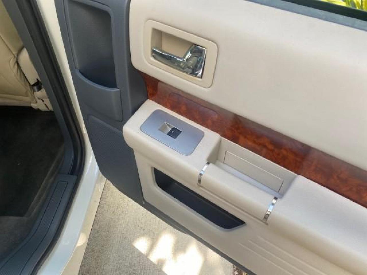 2009 White Suede /Medium Light Stone Ford Flex Limited LEATHER SUNROOF (2FMDK53C99B) with an 3.5L V6 Duratec Engine engine, Automatic transmission, located at 4701 North Dixie Hwy, Pompano Beach, FL, 33064, (954) 422-2889, 26.240938, -80.123474 - OUR WEBPAGE FLORIDACARS1.COM HAS OVER 100 PHOTOS AND FREE CARFAX LINK 2009 FORD FLEX VIN: 2FMDK53C99BA12573 4 DOOR LIMITED FWD 3.5L V6 DURATEC ENGINE GASOLINE FRONT WHEEL DRIVE Highlighted Features Bed Liner Cloth Seats ABS Brakes Automatic Transmission Power Locks AM/FM Stereo CD Audio Power Mirror - Photo#88