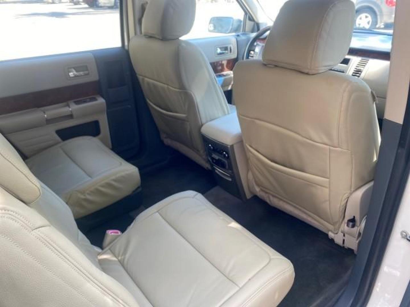 2009 White Suede /Medium Light Stone Ford Flex Limited LEATHER SUNROOF (2FMDK53C99B) with an 3.5L V6 Duratec Engine engine, Automatic transmission, located at 4701 North Dixie Hwy, Pompano Beach, FL, 33064, (954) 422-2889, 26.240938, -80.123474 - OUR WEBPAGE FLORIDACARS1.COM HAS OVER 100 PHOTOS AND FREE CARFAX LINK 2009 FORD FLEX VIN: 2FMDK53C99BA12573 4 DOOR LIMITED FWD 3.5L V6 DURATEC ENGINE GASOLINE FRONT WHEEL DRIVE Highlighted Features Bed Liner Cloth Seats ABS Brakes Automatic Transmission Power Locks AM/FM Stereo CD Audio Power Mirror - Photo#89