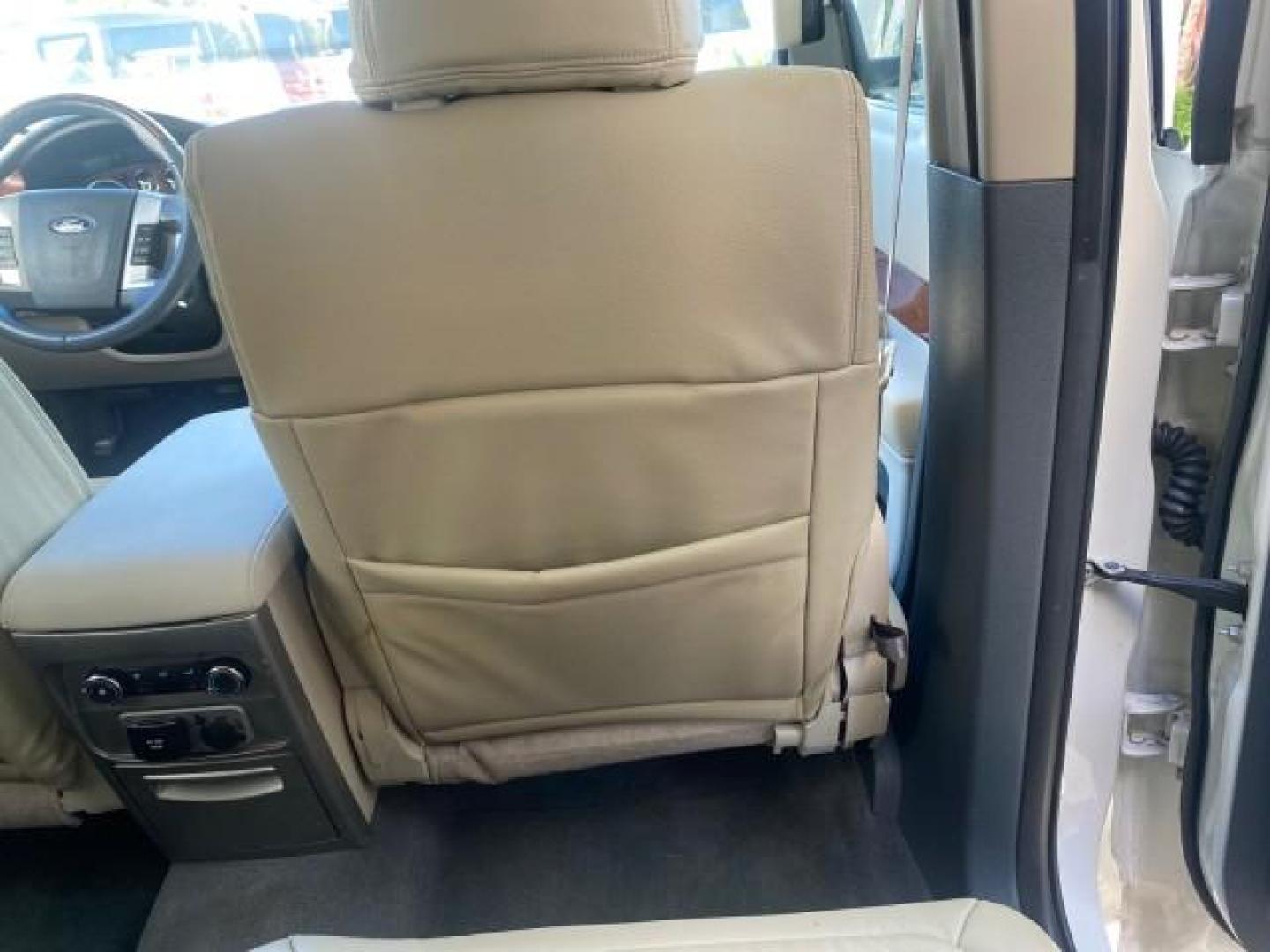 2009 White Suede /Medium Light Stone Ford Flex Limited LEATHER SUNROOF (2FMDK53C99B) with an 3.5L V6 Duratec Engine engine, Automatic transmission, located at 4701 North Dixie Hwy, Pompano Beach, FL, 33064, (954) 422-2889, 26.240938, -80.123474 - OUR WEBPAGE FLORIDACARS1.COM HAS OVER 100 PHOTOS AND FREE CARFAX LINK 2009 FORD FLEX VIN: 2FMDK53C99BA12573 4 DOOR LIMITED FWD 3.5L V6 DURATEC ENGINE GASOLINE FRONT WHEEL DRIVE Highlighted Features Bed Liner Cloth Seats ABS Brakes Automatic Transmission Power Locks AM/FM Stereo CD Audio Power Mirror - Photo#91