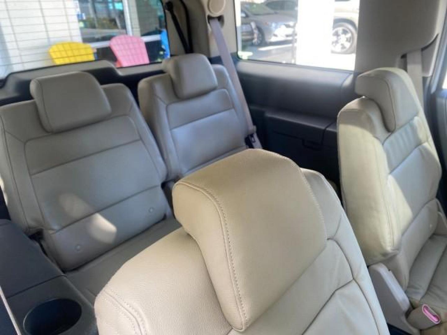 2009 White Suede /Medium Light Stone Ford Flex Limited LEATHER SUNROOF (2FMDK53C99B) with an 3.5L V6 Duratec Engine engine, Automatic transmission, located at 4701 North Dixie Hwy, Pompano Beach, FL, 33064, (954) 422-2889, 26.240938, -80.123474 - OUR WEBPAGE FLORIDACARS1.COM HAS OVER 100 PHOTOS AND FREE CARFAX LINK 2009 FORD FLEX VIN: 2FMDK53C99BA12573 4 DOOR LIMITED FWD 3.5L V6 DURATEC ENGINE GASOLINE FRONT WHEEL DRIVE Highlighted Features Bed Liner Cloth Seats ABS Brakes Automatic Transmission Power Locks AM/FM Stereo CD Audio Power Mirror - Photo#92