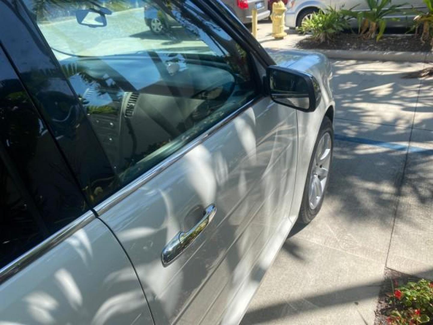 2009 White Suede /Medium Light Stone Ford Flex Limited LEATHER SUNROOF (2FMDK53C99B) with an 3.5L V6 Duratec Engine engine, Automatic transmission, located at 4701 North Dixie Hwy, Pompano Beach, FL, 33064, (954) 422-2889, 26.240938, -80.123474 - OUR WEBPAGE FLORIDACARS1.COM HAS OVER 100 PHOTOS AND FREE CARFAX LINK 2009 FORD FLEX VIN: 2FMDK53C99BA12573 4 DOOR LIMITED FWD 3.5L V6 DURATEC ENGINE GASOLINE FRONT WHEEL DRIVE Highlighted Features Bed Liner Cloth Seats ABS Brakes Automatic Transmission Power Locks AM/FM Stereo CD Audio Power Mirror - Photo#94