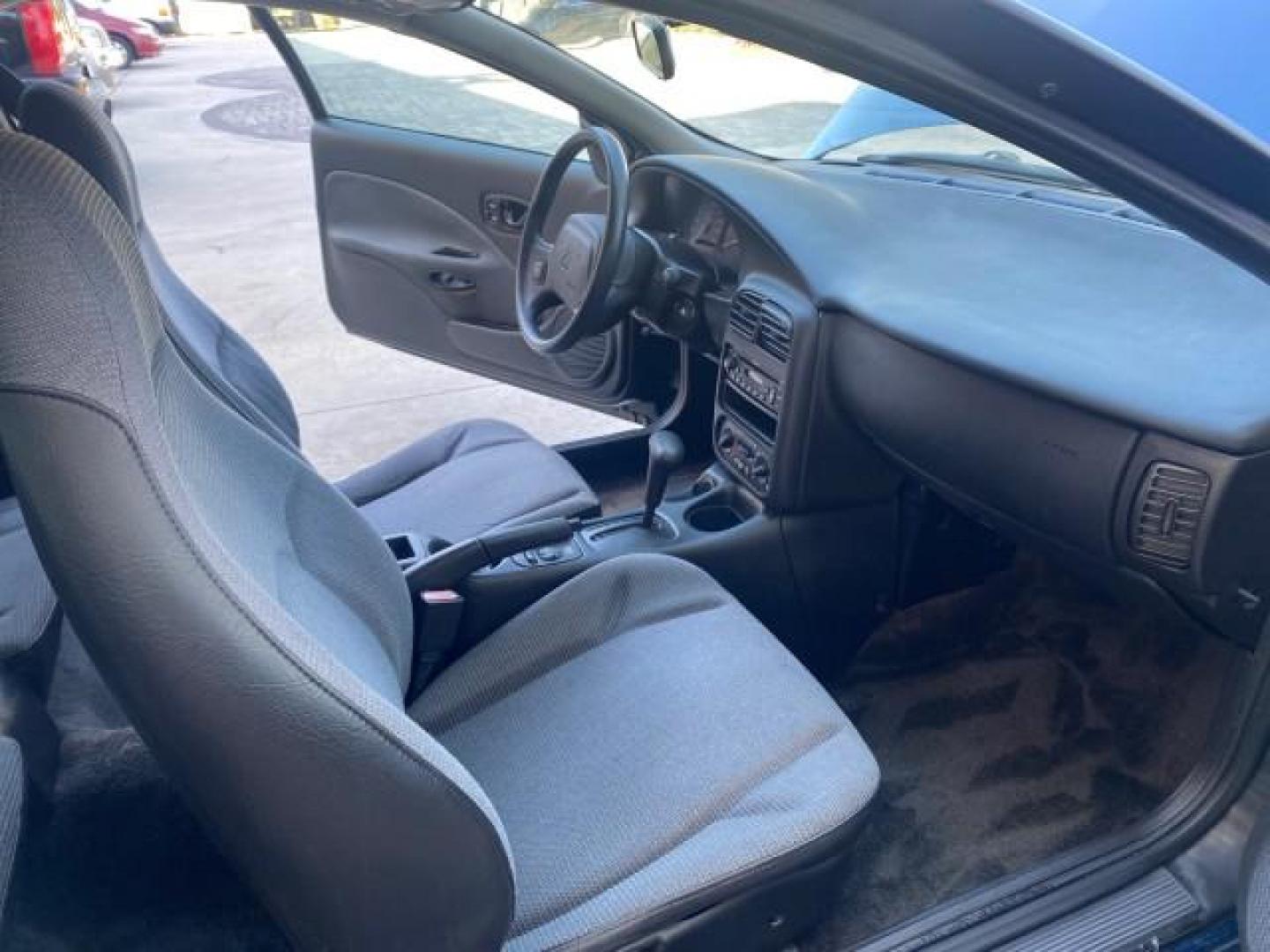 2001 Dark Blue /Grey Saturn SC 3dr COUPE LOW MILES 56,486 (1G8ZP128X1Z) with an 1.9L SOHC SPFI 8-Valve L4 Aluminum Engine engine, Automatic transmission, located at 4701 North Dixie Hwy, Pompano Beach, FL, 33064, (954) 422-2889, 26.240938, -80.123474 - OUR WEBPAGE FLORIDACARS1.COM HAS OVER 100 PHOTOS AND FREE CARFAX LINK 2001 SATURN S-SERIES SC1 VIN: 1G8ZP128X1Z255015 1 G 8 Z P 1 2 8 X 1 Z 2 5 5 0 1 5 COUPE 3 DR 1.9L I4 F SOHC GASOLINE FRONT WHEEL DRIVE Top Features Cloth Seats Leatherette and Cloth Basic Features AM/FM Stereo CD Audio Power Mir - Photo#12