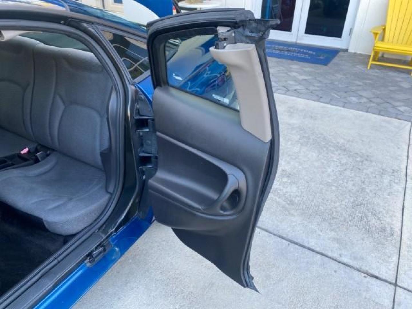 2001 Dark Blue /Grey Saturn SC 3dr COUPE LOW MILES 56,486 (1G8ZP128X1Z) with an 1.9L SOHC SPFI 8-Valve L4 Aluminum Engine engine, Automatic transmission, located at 4701 North Dixie Hwy, Pompano Beach, FL, 33064, (954) 422-2889, 26.240938, -80.123474 - OUR WEBPAGE FLORIDACARS1.COM HAS OVER 100 PHOTOS AND FREE CARFAX LINK 2001 SATURN S-SERIES SC1 VIN: 1G8ZP128X1Z255015 1 G 8 Z P 1 2 8 X 1 Z 2 5 5 0 1 5 COUPE 3 DR 1.9L I4 F SOHC GASOLINE FRONT WHEEL DRIVE Top Features Cloth Seats Leatherette and Cloth Basic Features AM/FM Stereo CD Audio Power Mir - Photo#13