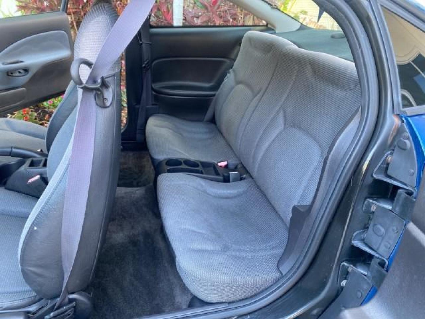 2001 Dark Blue /Grey Saturn SC 3dr COUPE LOW MILES 56,486 (1G8ZP128X1Z) with an 1.9L SOHC SPFI 8-Valve L4 Aluminum Engine engine, Automatic transmission, located at 4701 North Dixie Hwy, Pompano Beach, FL, 33064, (954) 422-2889, 26.240938, -80.123474 - OUR WEBPAGE FLORIDACARS1.COM HAS OVER 100 PHOTOS AND FREE CARFAX LINK 2001 SATURN S-SERIES SC1 VIN: 1G8ZP128X1Z255015 1 G 8 Z P 1 2 8 X 1 Z 2 5 5 0 1 5 COUPE 3 DR 1.9L I4 F SOHC GASOLINE FRONT WHEEL DRIVE Top Features Cloth Seats Leatherette and Cloth Basic Features AM/FM Stereo CD Audio Power Mir - Photo#14