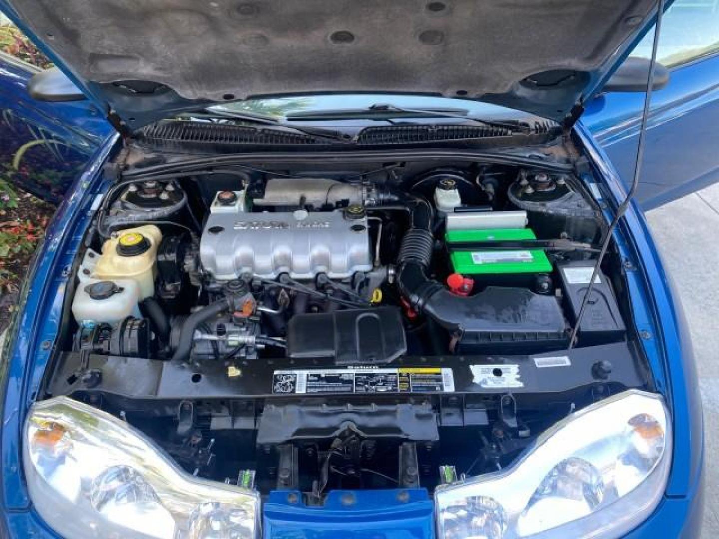 2001 Dark Blue /Grey Saturn SC 3dr COUPE LOW MILES 56,486 (1G8ZP128X1Z) with an 1.9L SOHC SPFI 8-Valve L4 Aluminum Engine engine, Automatic transmission, located at 4701 North Dixie Hwy, Pompano Beach, FL, 33064, (954) 422-2889, 26.240938, -80.123474 - OUR WEBPAGE FLORIDACARS1.COM HAS OVER 100 PHOTOS AND FREE CARFAX LINK 2001 SATURN S-SERIES SC1 VIN: 1G8ZP128X1Z255015 1 G 8 Z P 1 2 8 X 1 Z 2 5 5 0 1 5 COUPE 3 DR 1.9L I4 F SOHC GASOLINE FRONT WHEEL DRIVE Top Features Cloth Seats Leatherette and Cloth Basic Features AM/FM Stereo CD Audio Power Mir - Photo#17