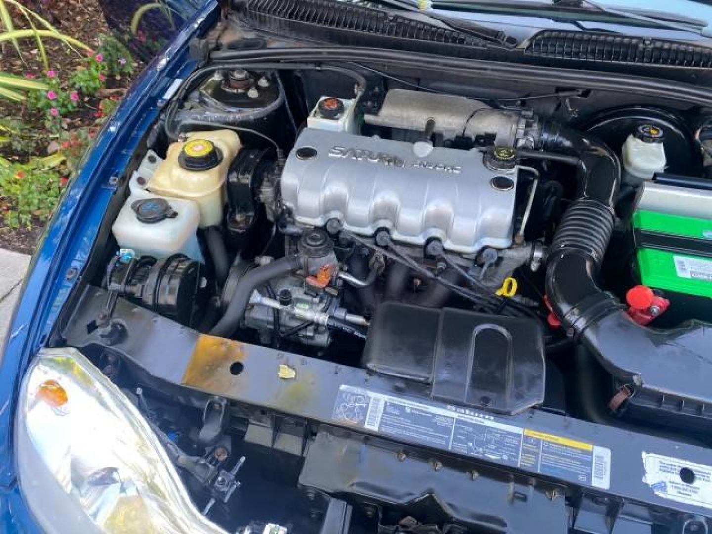 2001 Dark Blue /Grey Saturn SC 3dr COUPE LOW MILES 56,486 (1G8ZP128X1Z) with an 1.9L SOHC SPFI 8-Valve L4 Aluminum Engine engine, Automatic transmission, located at 4701 North Dixie Hwy, Pompano Beach, FL, 33064, (954) 422-2889, 26.240938, -80.123474 - OUR WEBPAGE FLORIDACARS1.COM HAS OVER 100 PHOTOS AND FREE CARFAX LINK 2001 SATURN S-SERIES SC1 VIN: 1G8ZP128X1Z255015 1 G 8 Z P 1 2 8 X 1 Z 2 5 5 0 1 5 COUPE 3 DR 1.9L I4 F SOHC GASOLINE FRONT WHEEL DRIVE Top Features Cloth Seats Leatherette and Cloth Basic Features AM/FM Stereo CD Audio Power Mir - Photo#18