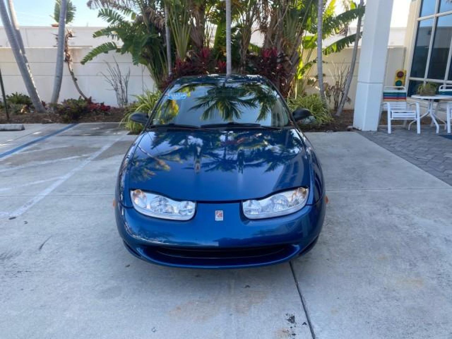 2001 Dark Blue /Grey Saturn SC 3dr COUPE LOW MILES 56,486 (1G8ZP128X1Z) with an 1.9L SOHC SPFI 8-Valve L4 Aluminum Engine engine, Automatic transmission, located at 4701 North Dixie Hwy, Pompano Beach, FL, 33064, (954) 422-2889, 26.240938, -80.123474 - OUR WEBPAGE FLORIDACARS1.COM HAS OVER 100 PHOTOS AND FREE CARFAX LINK 2001 SATURN S-SERIES SC1 VIN: 1G8ZP128X1Z255015 1 G 8 Z P 1 2 8 X 1 Z 2 5 5 0 1 5 COUPE 3 DR 1.9L I4 F SOHC GASOLINE FRONT WHEEL DRIVE Top Features Cloth Seats Leatherette and Cloth Basic Features AM/FM Stereo CD Audio Power Mir - Photo#1