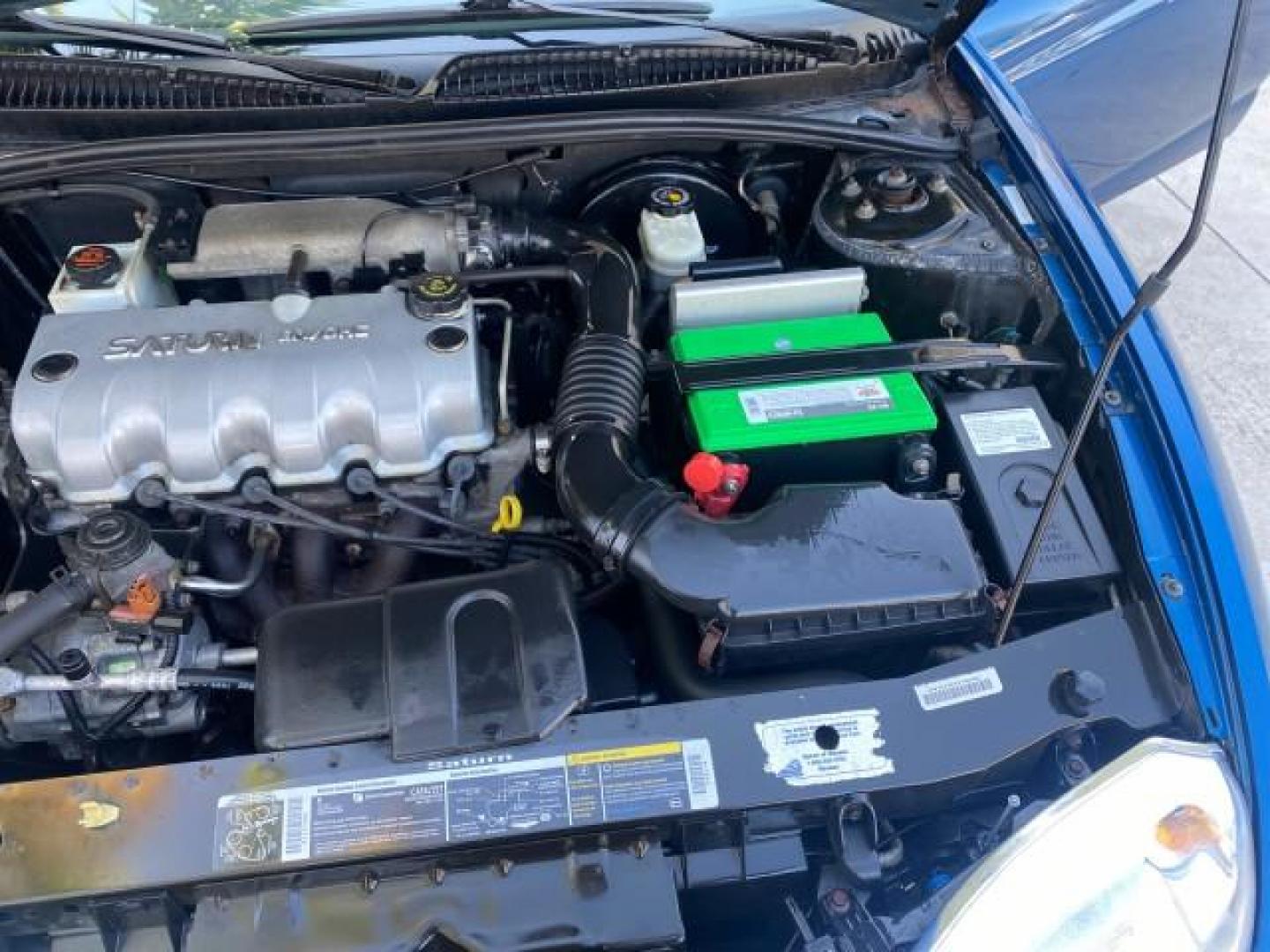 2001 Dark Blue /Grey Saturn SC 3dr COUPE LOW MILES 56,486 (1G8ZP128X1Z) with an 1.9L SOHC SPFI 8-Valve L4 Aluminum Engine engine, Automatic transmission, located at 4701 North Dixie Hwy, Pompano Beach, FL, 33064, (954) 422-2889, 26.240938, -80.123474 - OUR WEBPAGE FLORIDACARS1.COM HAS OVER 100 PHOTOS AND FREE CARFAX LINK 2001 SATURN S-SERIES SC1 VIN: 1G8ZP128X1Z255015 1 G 8 Z P 1 2 8 X 1 Z 2 5 5 0 1 5 COUPE 3 DR 1.9L I4 F SOHC GASOLINE FRONT WHEEL DRIVE Top Features Cloth Seats Leatherette and Cloth Basic Features AM/FM Stereo CD Audio Power Mir - Photo#19