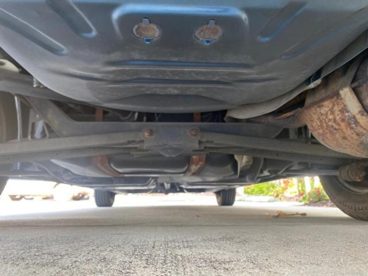 2001 Dark Blue /Grey Saturn SC 3dr COUPE LOW MILES 56,486 (1G8ZP128X1Z) with an 1.9L SOHC SPFI 8-Valve L4 Aluminum Engine engine, Automatic transmission, located at 4701 North Dixie Hwy, Pompano Beach, FL, 33064, (954) 422-2889, 26.240938, -80.123474 - OUR WEBPAGE FLORIDACARS1.COM HAS OVER 100 PHOTOS AND FREE CARFAX LINK 2001 SATURN S-SERIES SC1 VIN: 1G8ZP128X1Z255015 1 G 8 Z P 1 2 8 X 1 Z 2 5 5 0 1 5 COUPE 3 DR 1.9L I4 F SOHC GASOLINE FRONT WHEEL DRIVE Top Features Cloth Seats Leatherette and Cloth Basic Features AM/FM Stereo CD Audio Power Mir - Photo#25