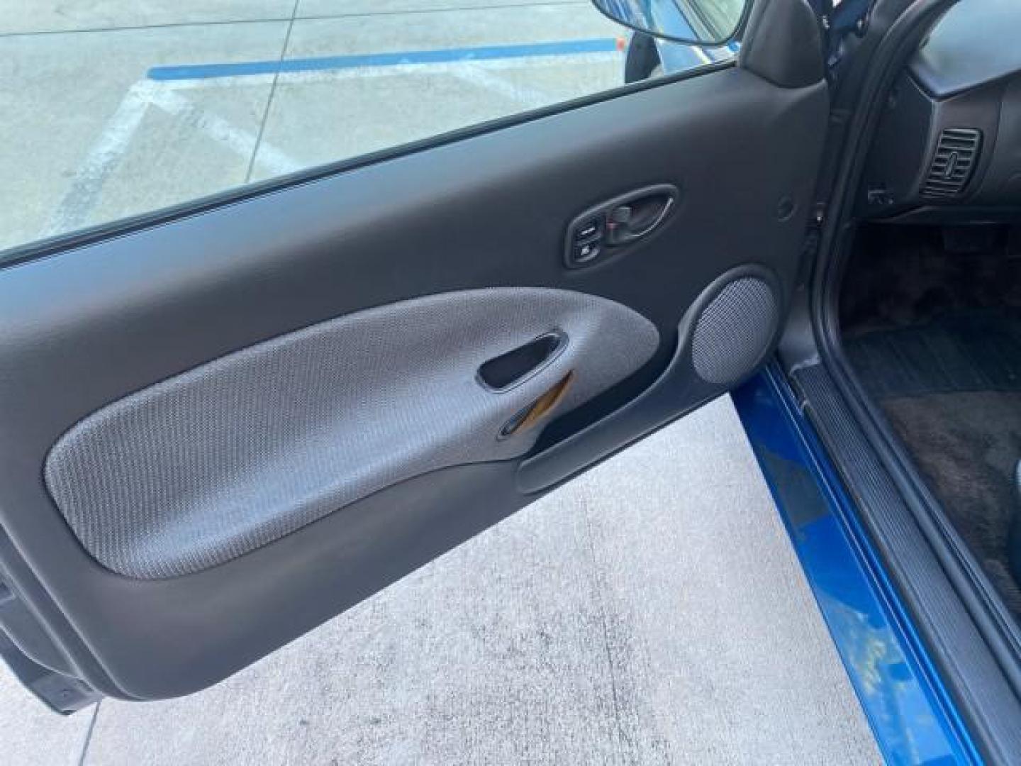 2001 Dark Blue /Grey Saturn SC 3dr COUPE LOW MILES 56,486 (1G8ZP128X1Z) with an 1.9L SOHC SPFI 8-Valve L4 Aluminum Engine engine, Automatic transmission, located at 4701 North Dixie Hwy, Pompano Beach, FL, 33064, (954) 422-2889, 26.240938, -80.123474 - OUR WEBPAGE FLORIDACARS1.COM HAS OVER 100 PHOTOS AND FREE CARFAX LINK 2001 SATURN S-SERIES SC1 VIN: 1G8ZP128X1Z255015 1 G 8 Z P 1 2 8 X 1 Z 2 5 5 0 1 5 COUPE 3 DR 1.9L I4 F SOHC GASOLINE FRONT WHEEL DRIVE Top Features Cloth Seats Leatherette and Cloth Basic Features AM/FM Stereo CD Audio Power Mir - Photo#26