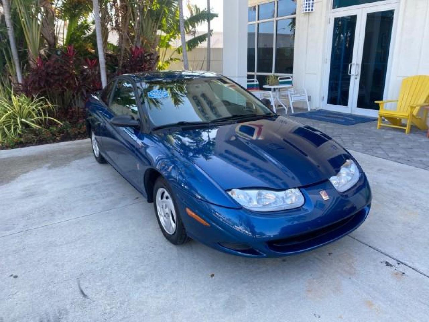 2001 Dark Blue /Grey Saturn SC 3dr COUPE LOW MILES 56,486 (1G8ZP128X1Z) with an 1.9L SOHC SPFI 8-Valve L4 Aluminum Engine engine, Automatic transmission, located at 4701 North Dixie Hwy, Pompano Beach, FL, 33064, (954) 422-2889, 26.240938, -80.123474 - OUR WEBPAGE FLORIDACARS1.COM HAS OVER 100 PHOTOS AND FREE CARFAX LINK 2001 SATURN S-SERIES SC1 VIN: 1G8ZP128X1Z255015 1 G 8 Z P 1 2 8 X 1 Z 2 5 5 0 1 5 COUPE 3 DR 1.9L I4 F SOHC GASOLINE FRONT WHEEL DRIVE Top Features Cloth Seats Leatherette and Cloth Basic Features AM/FM Stereo CD Audio Power Mir - Photo#2