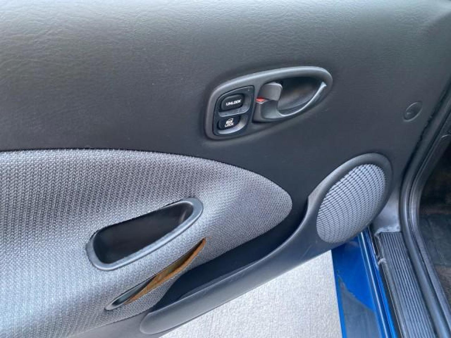 2001 Dark Blue /Grey Saturn SC 3dr COUPE LOW MILES 56,486 (1G8ZP128X1Z) with an 1.9L SOHC SPFI 8-Valve L4 Aluminum Engine engine, Automatic transmission, located at 4701 North Dixie Hwy, Pompano Beach, FL, 33064, (954) 422-2889, 26.240938, -80.123474 - OUR WEBPAGE FLORIDACARS1.COM HAS OVER 100 PHOTOS AND FREE CARFAX LINK 2001 SATURN S-SERIES SC1 VIN: 1G8ZP128X1Z255015 1 G 8 Z P 1 2 8 X 1 Z 2 5 5 0 1 5 COUPE 3 DR 1.9L I4 F SOHC GASOLINE FRONT WHEEL DRIVE Top Features Cloth Seats Leatherette and Cloth Basic Features AM/FM Stereo CD Audio Power Mir - Photo#32