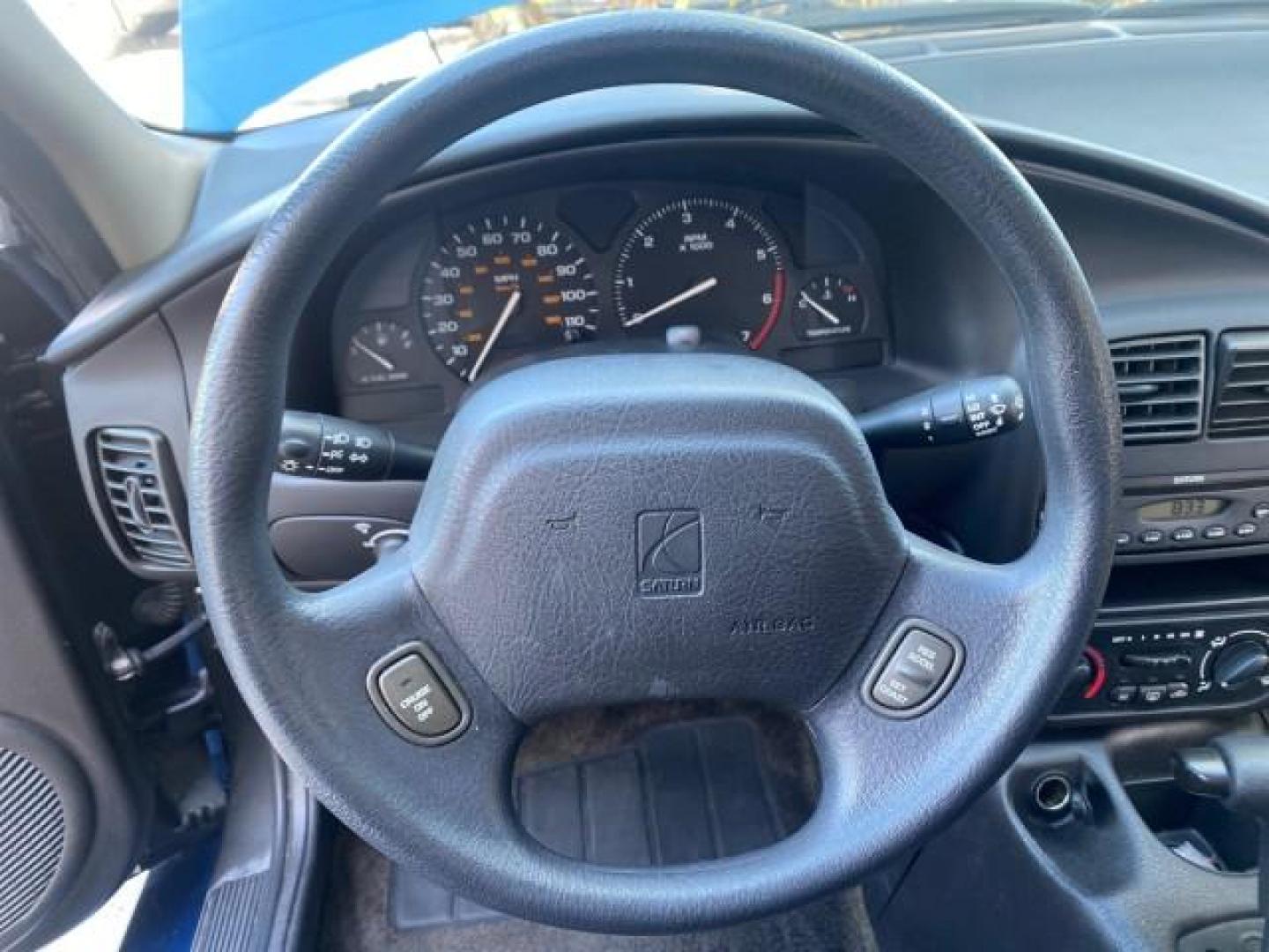 2001 Dark Blue /Grey Saturn SC 3dr COUPE LOW MILES 56,486 (1G8ZP128X1Z) with an 1.9L SOHC SPFI 8-Valve L4 Aluminum Engine engine, Automatic transmission, located at 4701 North Dixie Hwy, Pompano Beach, FL, 33064, (954) 422-2889, 26.240938, -80.123474 - OUR WEBPAGE FLORIDACARS1.COM HAS OVER 100 PHOTOS AND FREE CARFAX LINK 2001 SATURN S-SERIES SC1 VIN: 1G8ZP128X1Z255015 1 G 8 Z P 1 2 8 X 1 Z 2 5 5 0 1 5 COUPE 3 DR 1.9L I4 F SOHC GASOLINE FRONT WHEEL DRIVE Top Features Cloth Seats Leatherette and Cloth Basic Features AM/FM Stereo CD Audio Power Mir - Photo#33