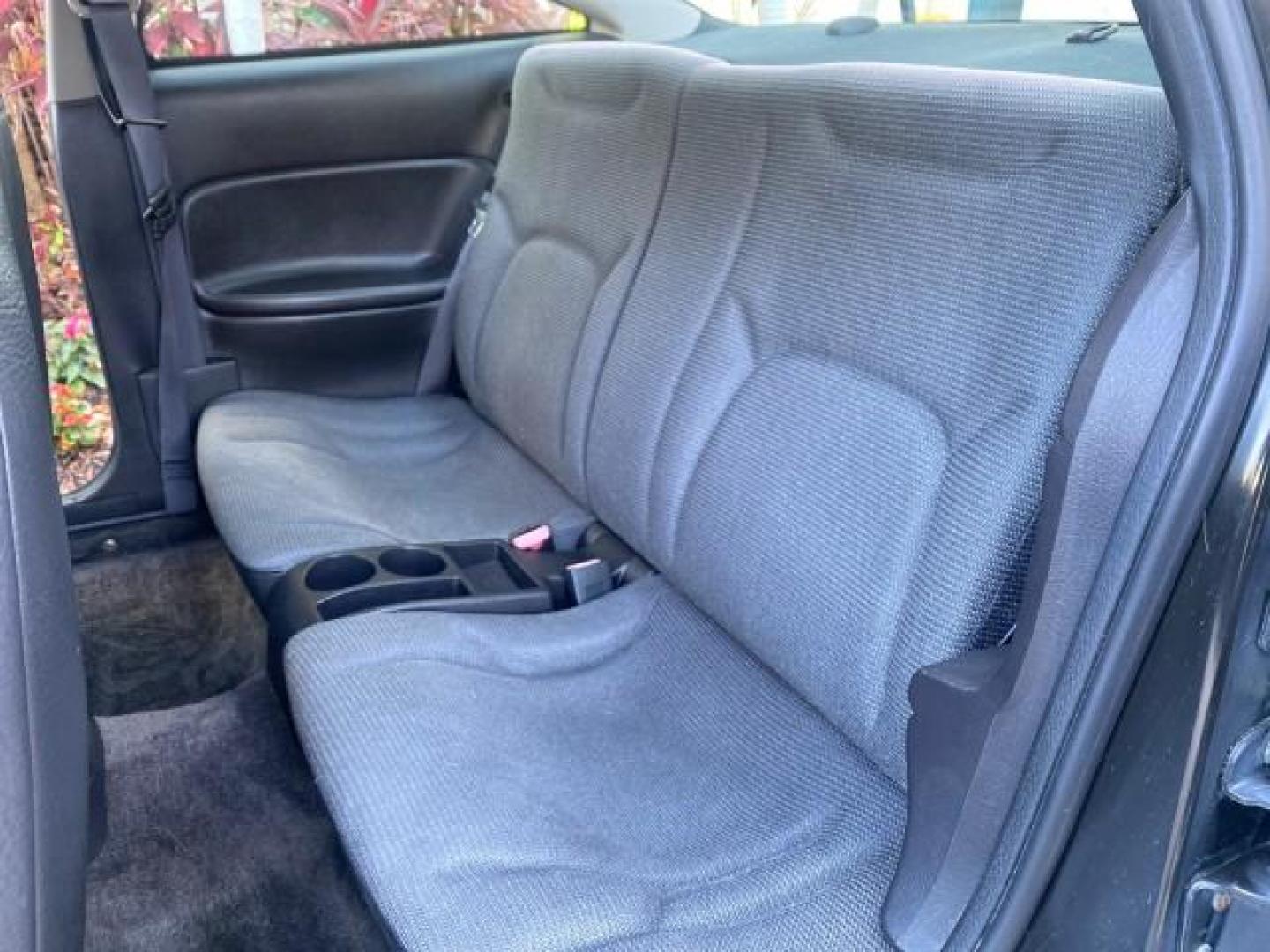 2001 Dark Blue /Grey Saturn SC 3dr COUPE LOW MILES 56,486 (1G8ZP128X1Z) with an 1.9L SOHC SPFI 8-Valve L4 Aluminum Engine engine, Automatic transmission, located at 4701 North Dixie Hwy, Pompano Beach, FL, 33064, (954) 422-2889, 26.240938, -80.123474 - OUR WEBPAGE FLORIDACARS1.COM HAS OVER 100 PHOTOS AND FREE CARFAX LINK 2001 SATURN S-SERIES SC1 VIN: 1G8ZP128X1Z255015 1 G 8 Z P 1 2 8 X 1 Z 2 5 5 0 1 5 COUPE 3 DR 1.9L I4 F SOHC GASOLINE FRONT WHEEL DRIVE Top Features Cloth Seats Leatherette and Cloth Basic Features AM/FM Stereo CD Audio Power Mir - Photo#49