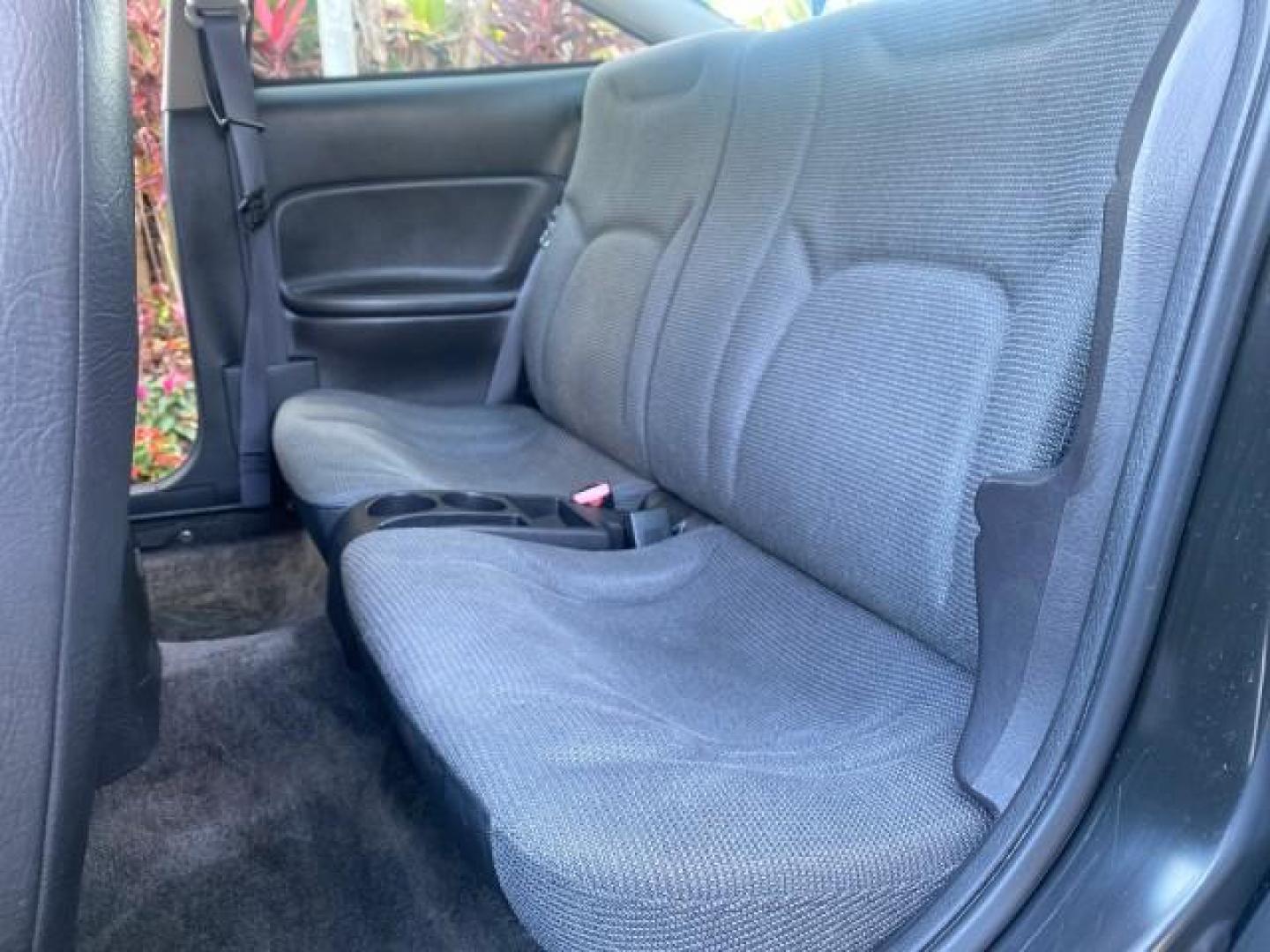 2001 Dark Blue /Grey Saturn SC 3dr COUPE LOW MILES 56,486 (1G8ZP128X1Z) with an 1.9L SOHC SPFI 8-Valve L4 Aluminum Engine engine, Automatic transmission, located at 4701 North Dixie Hwy, Pompano Beach, FL, 33064, (954) 422-2889, 26.240938, -80.123474 - OUR WEBPAGE FLORIDACARS1.COM HAS OVER 100 PHOTOS AND FREE CARFAX LINK 2001 SATURN S-SERIES SC1 VIN: 1G8ZP128X1Z255015 1 G 8 Z P 1 2 8 X 1 Z 2 5 5 0 1 5 COUPE 3 DR 1.9L I4 F SOHC GASOLINE FRONT WHEEL DRIVE Top Features Cloth Seats Leatherette and Cloth Basic Features AM/FM Stereo CD Audio Power Mir - Photo#50