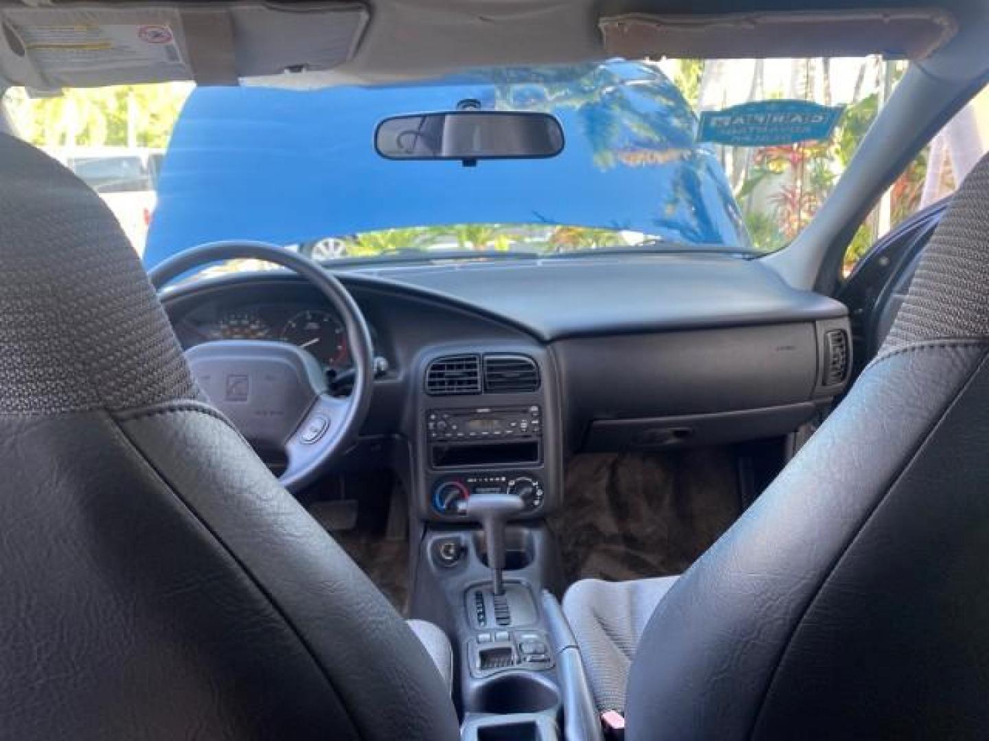 2001 Dark Blue /Grey Saturn SC 3dr COUPE LOW MILES 56,486 (1G8ZP128X1Z) with an 1.9L SOHC SPFI 8-Valve L4 Aluminum Engine engine, Automatic transmission, located at 4701 North Dixie Hwy, Pompano Beach, FL, 33064, (954) 422-2889, 26.240938, -80.123474 - OUR WEBPAGE FLORIDACARS1.COM HAS OVER 100 PHOTOS AND FREE CARFAX LINK 2001 SATURN S-SERIES SC1 VIN: 1G8ZP128X1Z255015 1 G 8 Z P 1 2 8 X 1 Z 2 5 5 0 1 5 COUPE 3 DR 1.9L I4 F SOHC GASOLINE FRONT WHEEL DRIVE Top Features Cloth Seats Leatherette and Cloth Basic Features AM/FM Stereo CD Audio Power Mir - Photo#51