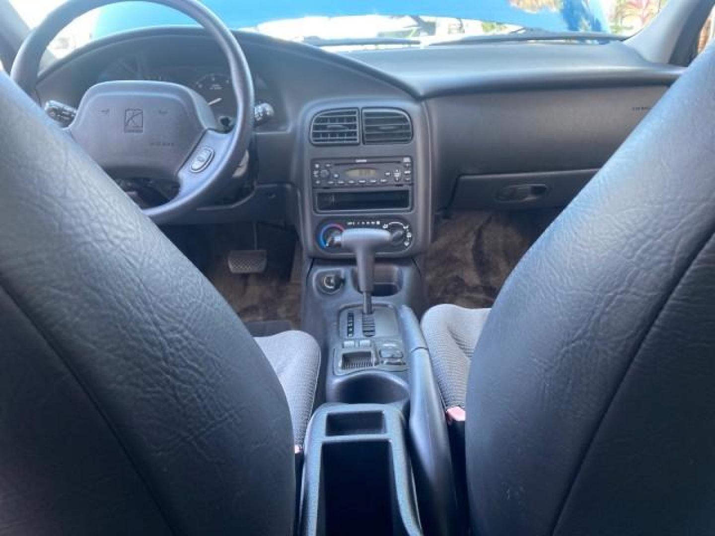 2001 Dark Blue /Grey Saturn SC 3dr COUPE LOW MILES 56,486 (1G8ZP128X1Z) with an 1.9L SOHC SPFI 8-Valve L4 Aluminum Engine engine, Automatic transmission, located at 4701 North Dixie Hwy, Pompano Beach, FL, 33064, (954) 422-2889, 26.240938, -80.123474 - OUR WEBPAGE FLORIDACARS1.COM HAS OVER 100 PHOTOS AND FREE CARFAX LINK 2001 SATURN S-SERIES SC1 VIN: 1G8ZP128X1Z255015 1 G 8 Z P 1 2 8 X 1 Z 2 5 5 0 1 5 COUPE 3 DR 1.9L I4 F SOHC GASOLINE FRONT WHEEL DRIVE Top Features Cloth Seats Leatherette and Cloth Basic Features AM/FM Stereo CD Audio Power Mir - Photo#52