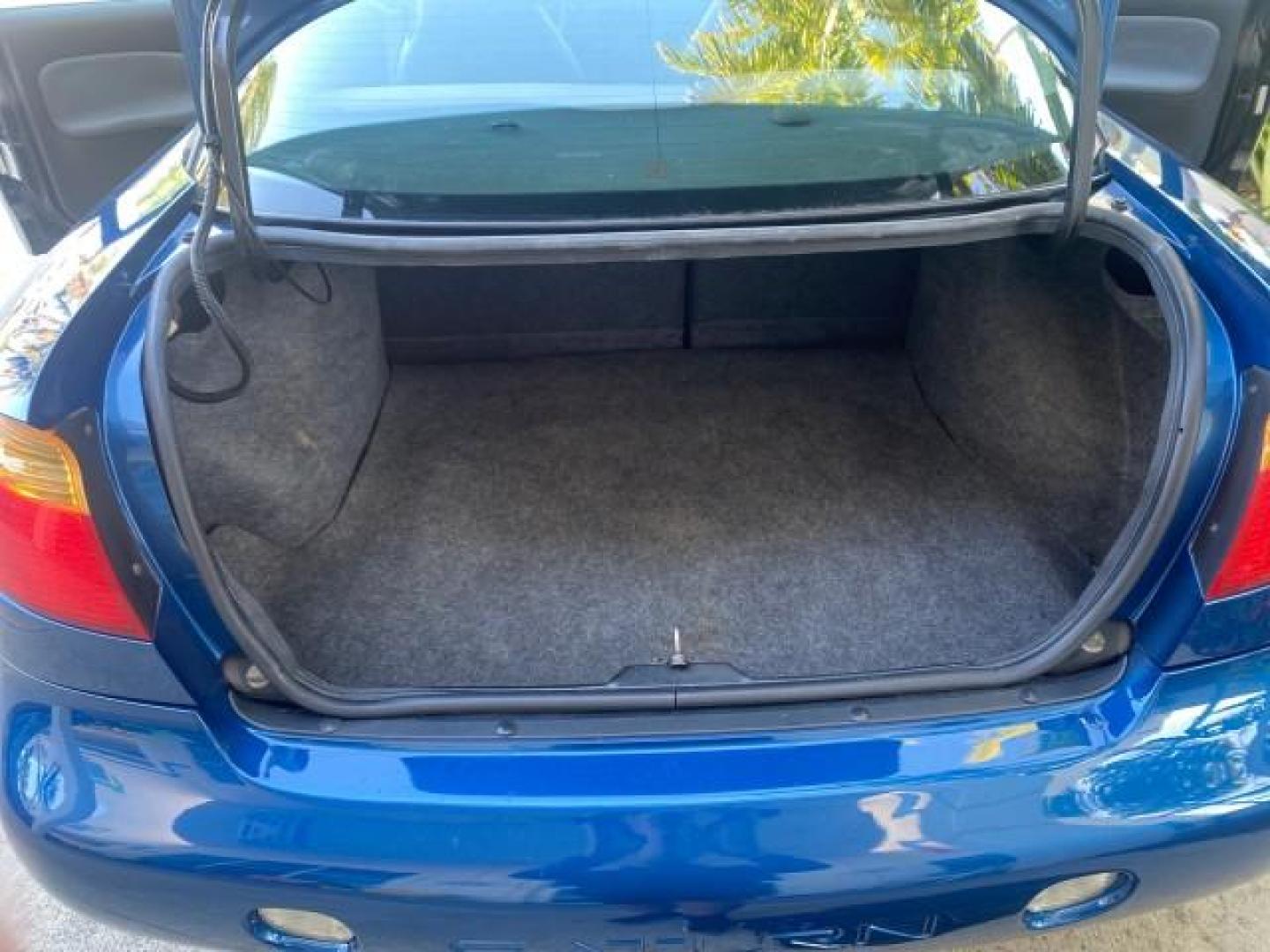 2001 Dark Blue /Grey Saturn SC 3dr COUPE LOW MILES 56,486 (1G8ZP128X1Z) with an 1.9L SOHC SPFI 8-Valve L4 Aluminum Engine engine, Automatic transmission, located at 4701 North Dixie Hwy, Pompano Beach, FL, 33064, (954) 422-2889, 26.240938, -80.123474 - OUR WEBPAGE FLORIDACARS1.COM HAS OVER 100 PHOTOS AND FREE CARFAX LINK 2001 SATURN S-SERIES SC1 VIN: 1G8ZP128X1Z255015 1 G 8 Z P 1 2 8 X 1 Z 2 5 5 0 1 5 COUPE 3 DR 1.9L I4 F SOHC GASOLINE FRONT WHEEL DRIVE Top Features Cloth Seats Leatherette and Cloth Basic Features AM/FM Stereo CD Audio Power Mir - Photo#59