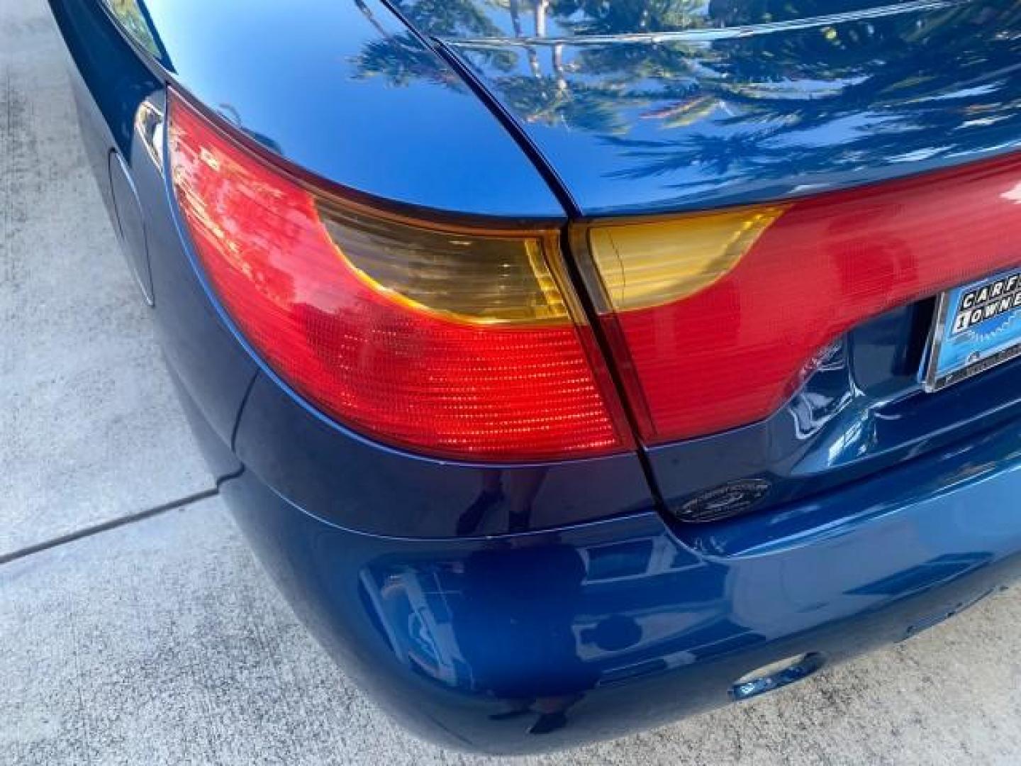 2001 Dark Blue /Grey Saturn SC 3dr COUPE LOW MILES 56,486 (1G8ZP128X1Z) with an 1.9L SOHC SPFI 8-Valve L4 Aluminum Engine engine, Automatic transmission, located at 4701 North Dixie Hwy, Pompano Beach, FL, 33064, (954) 422-2889, 26.240938, -80.123474 - OUR WEBPAGE FLORIDACARS1.COM HAS OVER 100 PHOTOS AND FREE CARFAX LINK 2001 SATURN S-SERIES SC1 VIN: 1G8ZP128X1Z255015 1 G 8 Z P 1 2 8 X 1 Z 2 5 5 0 1 5 COUPE 3 DR 1.9L I4 F SOHC GASOLINE FRONT WHEEL DRIVE Top Features Cloth Seats Leatherette and Cloth Basic Features AM/FM Stereo CD Audio Power Mir - Photo#60