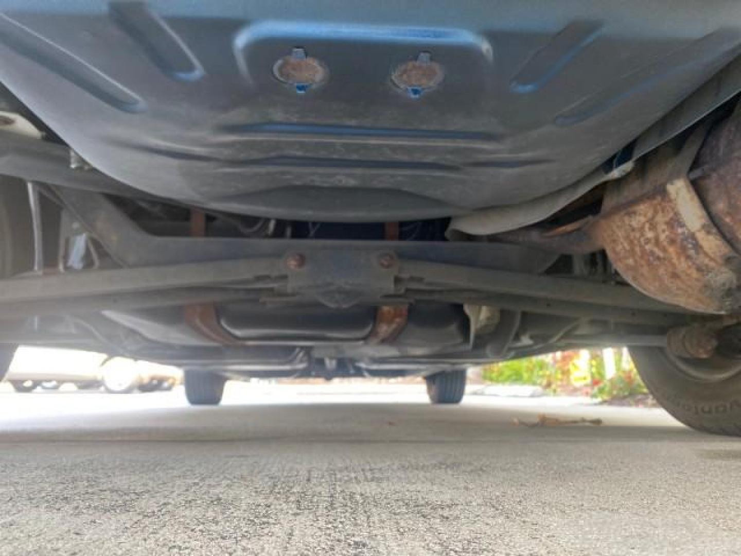 2001 Dark Blue /Grey Saturn SC 3dr COUPE LOW MILES 56,486 (1G8ZP128X1Z) with an 1.9L SOHC SPFI 8-Valve L4 Aluminum Engine engine, Automatic transmission, located at 4701 North Dixie Hwy, Pompano Beach, FL, 33064, (954) 422-2889, 26.240938, -80.123474 - OUR WEBPAGE FLORIDACARS1.COM HAS OVER 100 PHOTOS AND FREE CARFAX LINK 2001 SATURN S-SERIES SC1 VIN: 1G8ZP128X1Z255015 1 G 8 Z P 1 2 8 X 1 Z 2 5 5 0 1 5 COUPE 3 DR 1.9L I4 F SOHC GASOLINE FRONT WHEEL DRIVE Top Features Cloth Seats Leatherette and Cloth Basic Features AM/FM Stereo CD Audio Power Mir - Photo#63