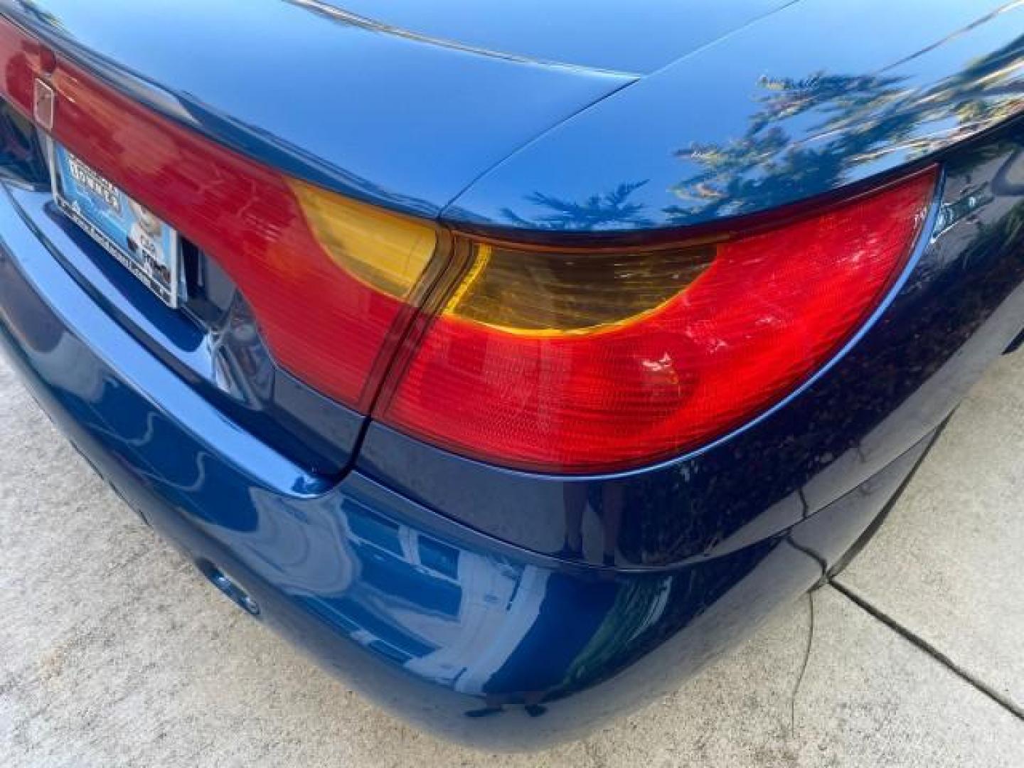 2001 Dark Blue /Grey Saturn SC 3dr COUPE LOW MILES 56,486 (1G8ZP128X1Z) with an 1.9L SOHC SPFI 8-Valve L4 Aluminum Engine engine, Automatic transmission, located at 4701 North Dixie Hwy, Pompano Beach, FL, 33064, (954) 422-2889, 26.240938, -80.123474 - OUR WEBPAGE FLORIDACARS1.COM HAS OVER 100 PHOTOS AND FREE CARFAX LINK 2001 SATURN S-SERIES SC1 VIN: 1G8ZP128X1Z255015 1 G 8 Z P 1 2 8 X 1 Z 2 5 5 0 1 5 COUPE 3 DR 1.9L I4 F SOHC GASOLINE FRONT WHEEL DRIVE Top Features Cloth Seats Leatherette and Cloth Basic Features AM/FM Stereo CD Audio Power Mir - Photo#65