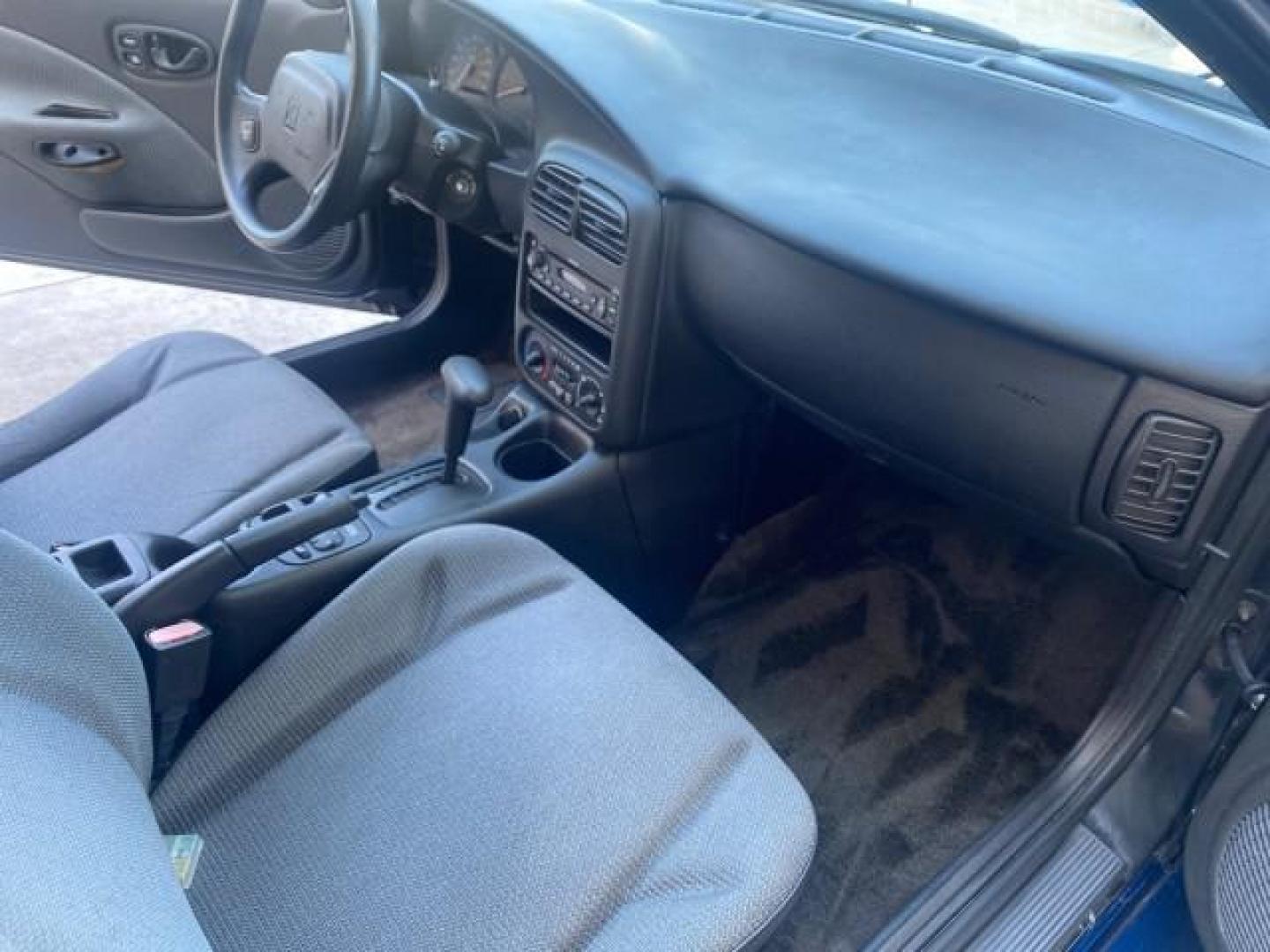 2001 Dark Blue /Grey Saturn SC 3dr COUPE LOW MILES 56,486 (1G8ZP128X1Z) with an 1.9L SOHC SPFI 8-Valve L4 Aluminum Engine engine, Automatic transmission, located at 4701 North Dixie Hwy, Pompano Beach, FL, 33064, (954) 422-2889, 26.240938, -80.123474 - OUR WEBPAGE FLORIDACARS1.COM HAS OVER 100 PHOTOS AND FREE CARFAX LINK 2001 SATURN S-SERIES SC1 VIN: 1G8ZP128X1Z255015 1 G 8 Z P 1 2 8 X 1 Z 2 5 5 0 1 5 COUPE 3 DR 1.9L I4 F SOHC GASOLINE FRONT WHEEL DRIVE Top Features Cloth Seats Leatherette and Cloth Basic Features AM/FM Stereo CD Audio Power Mir - Photo#70