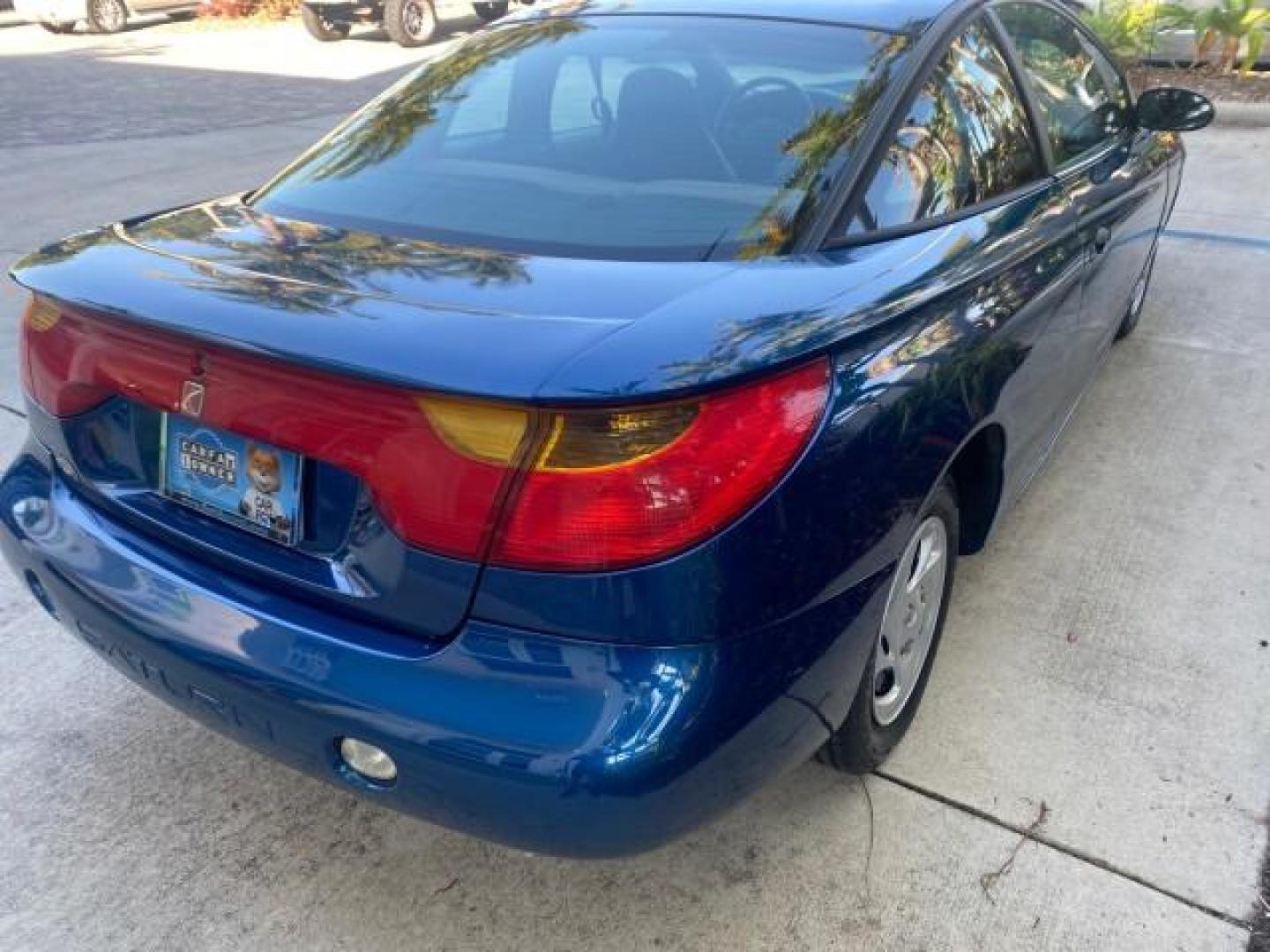2001 Dark Blue /Grey Saturn SC 3dr COUPE LOW MILES 56,486 (1G8ZP128X1Z) with an 1.9L SOHC SPFI 8-Valve L4 Aluminum Engine engine, Automatic transmission, located at 4701 North Dixie Hwy, Pompano Beach, FL, 33064, (954) 422-2889, 26.240938, -80.123474 - OUR WEBPAGE FLORIDACARS1.COM HAS OVER 100 PHOTOS AND FREE CARFAX LINK 2001 SATURN S-SERIES SC1 VIN: 1G8ZP128X1Z255015 1 G 8 Z P 1 2 8 X 1 Z 2 5 5 0 1 5 COUPE 3 DR 1.9L I4 F SOHC GASOLINE FRONT WHEEL DRIVE Top Features Cloth Seats Leatherette and Cloth Basic Features AM/FM Stereo CD Audio Power Mir - Photo#87