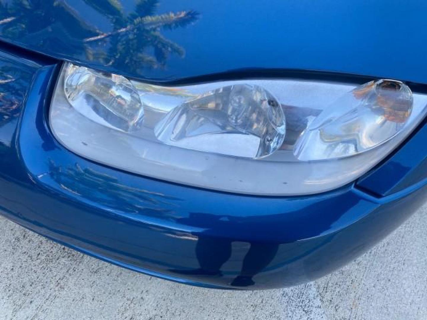 2001 Dark Blue /Grey Saturn SC 3dr COUPE LOW MILES 56,486 (1G8ZP128X1Z) with an 1.9L SOHC SPFI 8-Valve L4 Aluminum Engine engine, Automatic transmission, located at 4701 North Dixie Hwy, Pompano Beach, FL, 33064, (954) 422-2889, 26.240938, -80.123474 - OUR WEBPAGE FLORIDACARS1.COM HAS OVER 100 PHOTOS AND FREE CARFAX LINK 2001 SATURN S-SERIES SC1 VIN: 1G8ZP128X1Z255015 1 G 8 Z P 1 2 8 X 1 Z 2 5 5 0 1 5 COUPE 3 DR 1.9L I4 F SOHC GASOLINE FRONT WHEEL DRIVE Top Features Cloth Seats Leatherette and Cloth Basic Features AM/FM Stereo CD Audio Power Mir - Photo#88