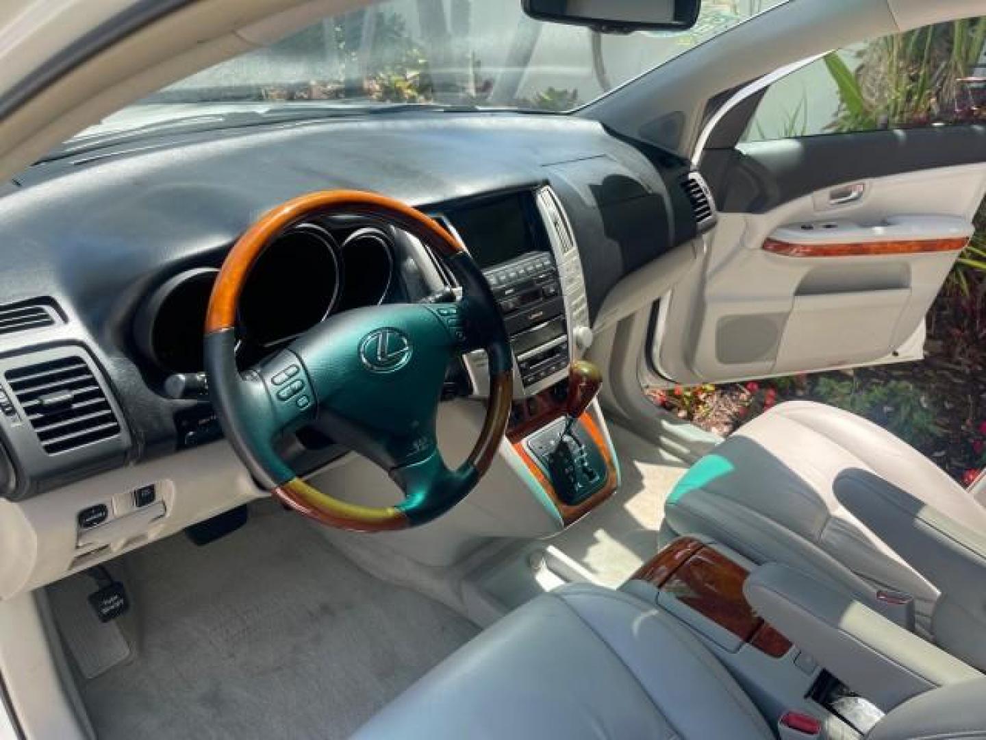 2008 Crystal White /Ivory Lexus RX 350 LUXERY 1 OWNER FL LOW MILES 48,341 (2T2GK31U68C) with an 3.5L DOHC SFI 24-Valve V6 Engine engine, Automatic transmission, located at 4701 North Dixie Hwy, Pompano Beach, FL, 33064, (954) 422-2889, 26.240938, -80.123474 - OUR WEBPAGE FLORIDACARS1.COM HAS OVER 100 PHOTOS AND FREE CARFAX LINK 2008 Lexus RX 350 1 OWNER FLORIDA SUNROOF $ 45,101 NEW ! 2008 LEXUS RX 350 VIN: 2T2GK31U68C046814 2 T 2 G K 3 1 U 6 8 C 0 4 6 8 1 4 4 DOOR WAGON/SPORT UTILITY 3.5L V6 F DOHC 24V GASOLINE FRONT WHEEL DRIVE Top Features Alloy Wheels - Photo#10