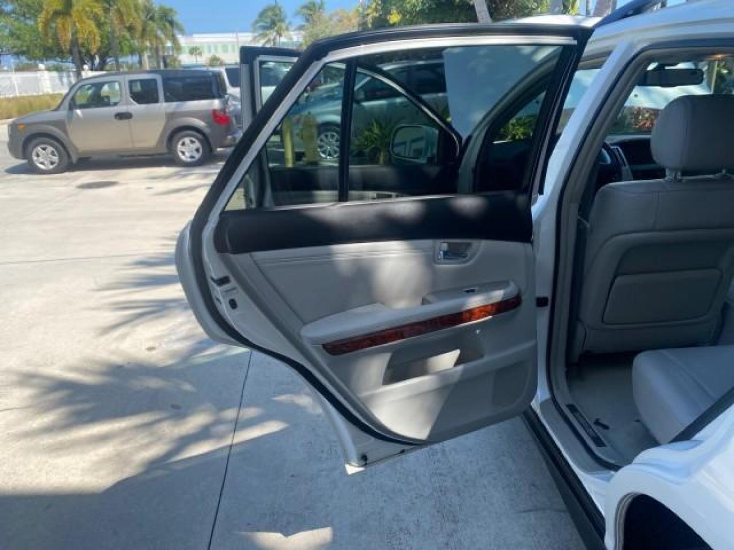 2008 Crystal White /Ivory Lexus RX 350 LUXERY 1 OWNER FL LOW MILES 48,341 (2T2GK31U68C) with an 3.5L DOHC SFI 24-Valve V6 Engine engine, Automatic transmission, located at 4701 North Dixie Hwy, Pompano Beach, FL, 33064, (954) 422-2889, 26.240938, -80.123474 - OUR WEBPAGE FLORIDACARS1.COM HAS OVER 100 PHOTOS AND FREE CARFAX LINK 2008 Lexus RX 350 1 OWNER FLORIDA SUNROOF $ 45,101 NEW ! 2008 LEXUS RX 350 VIN: 2T2GK31U68C046814 2 T 2 G K 3 1 U 6 8 C 0 4 6 8 1 4 4 DOOR WAGON/SPORT UTILITY 3.5L V6 F DOHC 24V GASOLINE FRONT WHEEL DRIVE Top Features Alloy Wheels - Photo#25