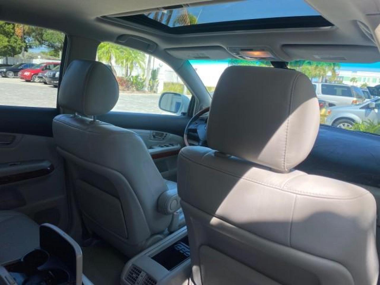 2008 Crystal White /Ivory Lexus RX 350 LUXERY 1 OWNER FL LOW MILES 48,341 (2T2GK31U68C) with an 3.5L DOHC SFI 24-Valve V6 Engine engine, Automatic transmission, located at 4701 North Dixie Hwy, Pompano Beach, FL, 33064, (954) 422-2889, 26.240938, -80.123474 - OUR WEBPAGE FLORIDACARS1.COM HAS OVER 100 PHOTOS AND FREE CARFAX LINK 2008 Lexus RX 350 1 OWNER FLORIDA SUNROOF $ 45,101 NEW ! 2008 LEXUS RX 350 VIN: 2T2GK31U68C046814 2 T 2 G K 3 1 U 6 8 C 0 4 6 8 1 4 4 DOOR WAGON/SPORT UTILITY 3.5L V6 F DOHC 24V GASOLINE FRONT WHEEL DRIVE Top Features Alloy Wheels - Photo#79