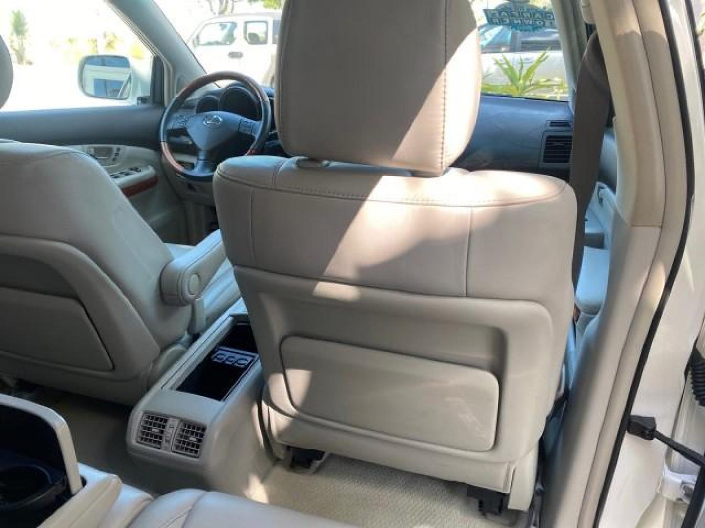 2008 Crystal White /Ivory Lexus RX 350 LUXERY 1 OWNER FL LOW MILES 48,341 (2T2GK31U68C) with an 3.5L DOHC SFI 24-Valve V6 Engine engine, Automatic transmission, located at 4701 North Dixie Hwy, Pompano Beach, FL, 33064, (954) 422-2889, 26.240938, -80.123474 - OUR WEBPAGE FLORIDACARS1.COM HAS OVER 100 PHOTOS AND FREE CARFAX LINK 2008 Lexus RX 350 1 OWNER FLORIDA SUNROOF $ 45,101 NEW ! 2008 LEXUS RX 350 VIN: 2T2GK31U68C046814 2 T 2 G K 3 1 U 6 8 C 0 4 6 8 1 4 4 DOOR WAGON/SPORT UTILITY 3.5L V6 F DOHC 24V GASOLINE FRONT WHEEL DRIVE Top Features Alloy Wheels - Photo#83