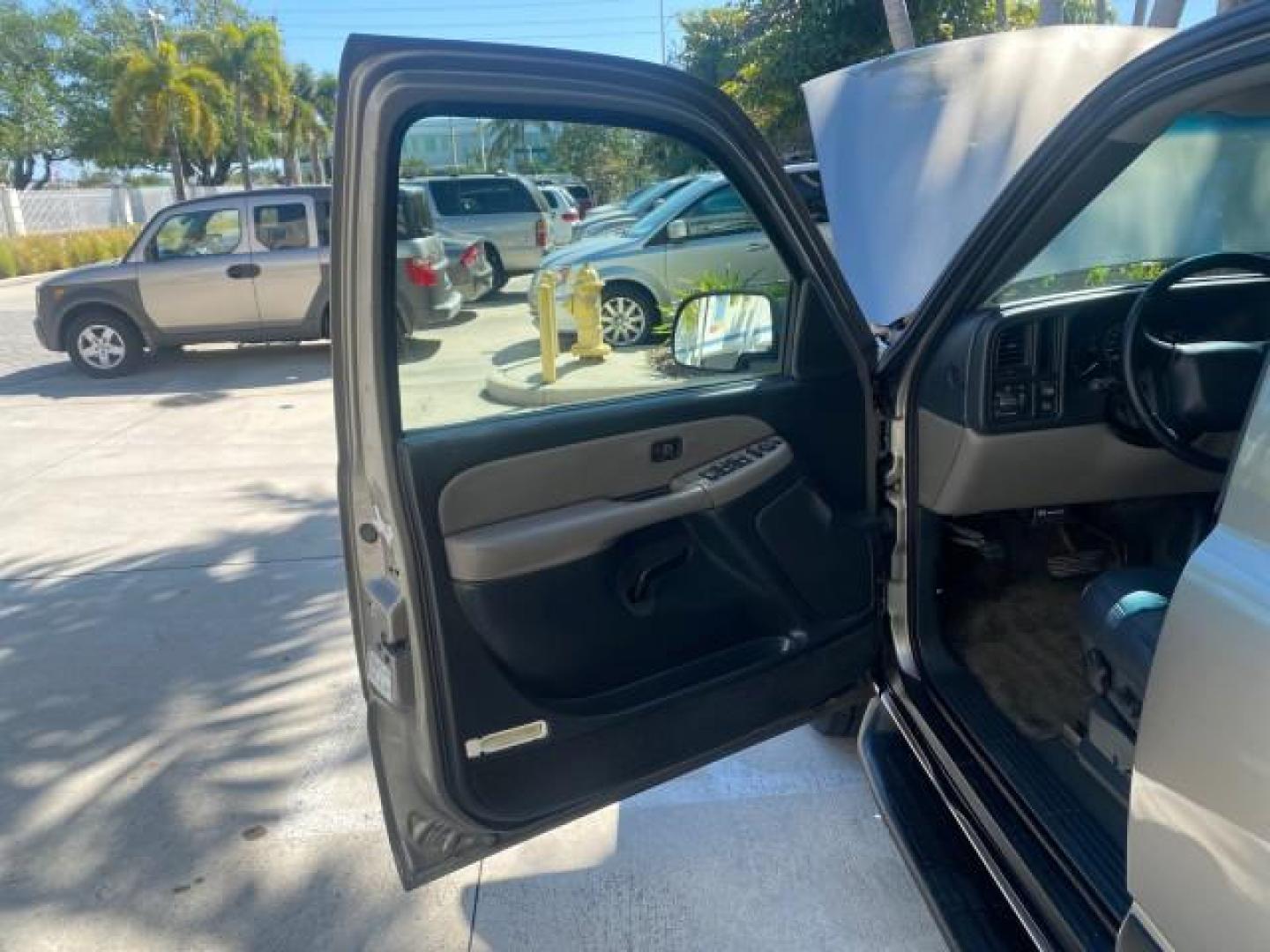2002 Light Pewter Metallic /Gpht/Med Gray Chevrolet Tahoe LS FLORIDA LOW MILES 55,735 (1GNEC13Z72R) with an 5.3L Vortec 1000 SFI V8 Engine engine, Automatic transmission, located at 4701 North Dixie Hwy, Pompano Beach, FL, 33064, (954) 422-2889, 26.240938, -80.123474 - OUR WEBPAGE FLORIDACARS1.COM HAS OVER 100 PHOTOS AND FREE CARFAX LINK 2002 CHEVROLET TAHOE LS LEATHER $ 35,524 NEW VIN: 1GNEC13Z72R225695 1 G N E C 1 3 Z 7 2 R 2 2 5 6 9 5 4 DOOR WAGON/SPORT UTILITY 5.3L V8 F FLEX FUEL REAR WHEEL DRIVE Top Features Alloy Wheels Cloth Seats Running Boards Basic Featu - Photo#9
