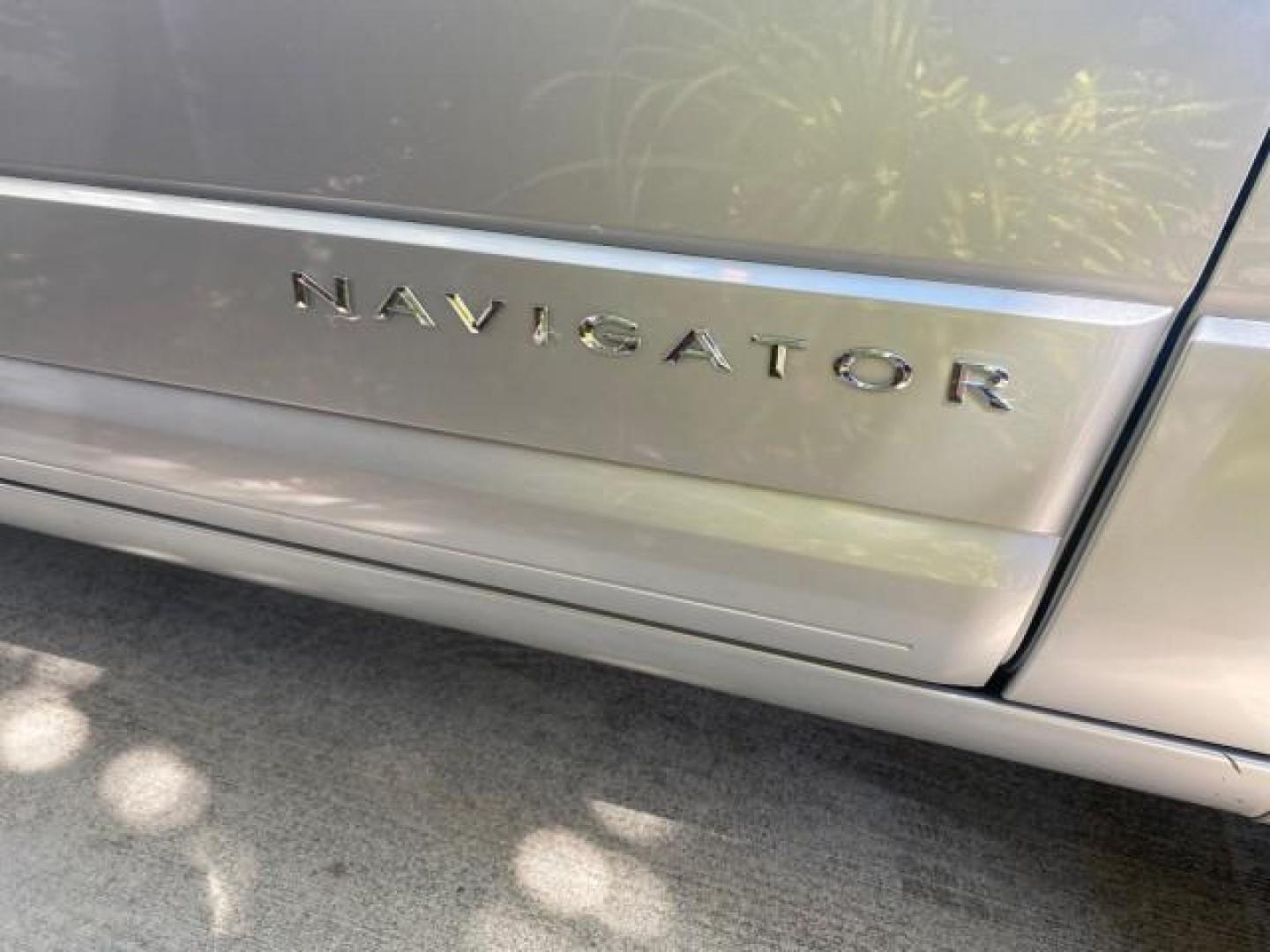 2011 Sterling Gray Metallic /Stone Lincoln Navigator 1 OWNER LOW MILES 53,320 (5LMJJ2H54BE) with an 5.4L SOHC 24-Valve V8 FFV Engine engine, Automatic transmission, located at 4701 North Dixie Hwy, Pompano Beach, FL, 33064, (954) 422-2889, 26.240938, -80.123474 - OUR WEBPAGE FLORIDACARS1.COM HAS OVER 100 PHOTOS AND FREE CARFAX LINK 2011 LINCOLN NAVIGATOR WE ADDED NEW FRONT ROTORS AND PADS VIN: 5LMJJ2H54BEJ04941 5 L M J J 2 H 5 4 B E J 0 4 9 4 1 4 DOOR WAGON/SPORT UTILITY 5.4L V8 F SOHC 24V FLEX FUEL REAR WHEEL DRIVE Top Features A/C Seat(s) Quad Seats Alloy - Photo#99