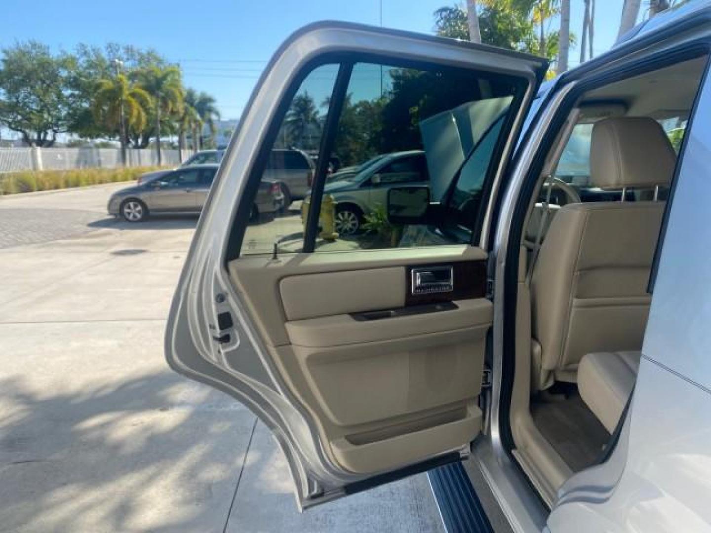 2011 Sterling Gray Metallic /Stone Lincoln Navigator 1 OWNER LOW MILES 53,320 (5LMJJ2H54BE) with an 5.4L SOHC 24-Valve V8 FFV Engine engine, Automatic transmission, located at 4701 North Dixie Hwy, Pompano Beach, FL, 33064, (954) 422-2889, 26.240938, -80.123474 - OUR WEBPAGE FLORIDACARS1.COM HAS OVER 100 PHOTOS AND FREE CARFAX LINK 2011 LINCOLN NAVIGATOR WE ADDED NEW FRONT ROTORS AND PADS VIN: 5LMJJ2H54BEJ04941 5 L M J J 2 H 5 4 B E J 0 4 9 4 1 4 DOOR WAGON/SPORT UTILITY 5.4L V8 F SOHC 24V FLEX FUEL REAR WHEEL DRIVE Top Features A/C Seat(s) Quad Seats Alloy - Photo#13