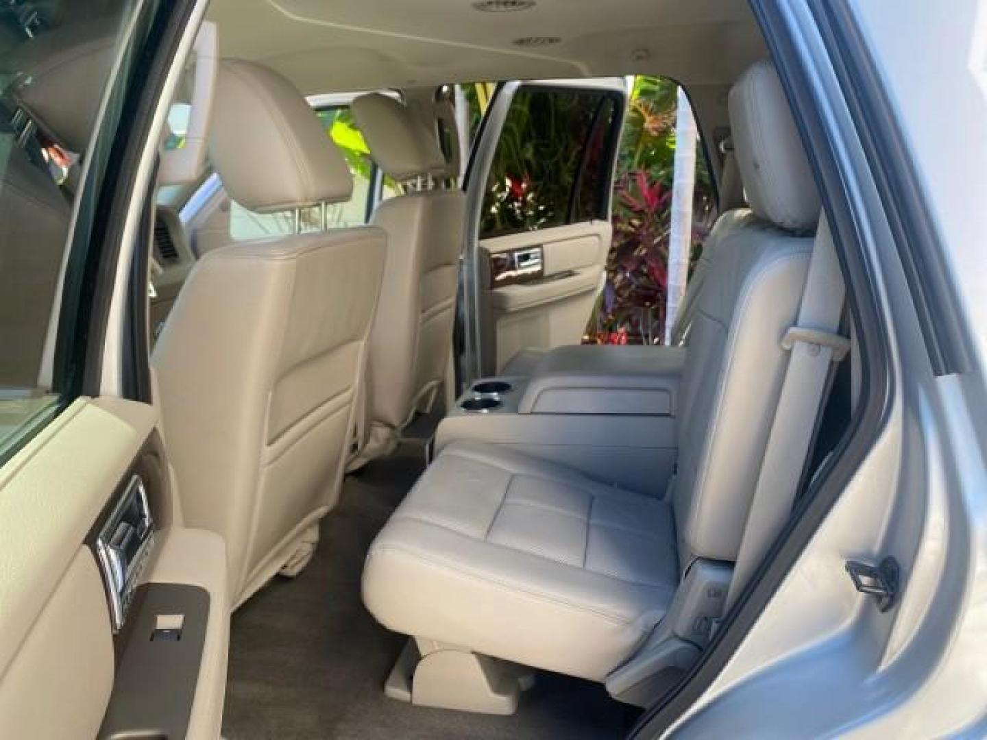 2011 Sterling Gray Metallic /Stone Lincoln Navigator 1 OWNER LOW MILES 53,320 (5LMJJ2H54BE) with an 5.4L SOHC 24-Valve V8 FFV Engine engine, Automatic transmission, located at 4701 North Dixie Hwy, Pompano Beach, FL, 33064, (954) 422-2889, 26.240938, -80.123474 - OUR WEBPAGE FLORIDACARS1.COM HAS OVER 100 PHOTOS AND FREE CARFAX LINK 2011 LINCOLN NAVIGATOR WE ADDED NEW FRONT ROTORS AND PADS VIN: 5LMJJ2H54BEJ04941 5 L M J J 2 H 5 4 B E J 0 4 9 4 1 4 DOOR WAGON/SPORT UTILITY 5.4L V8 F SOHC 24V FLEX FUEL REAR WHEEL DRIVE Top Features A/C Seat(s) Quad Seats Alloy - Photo#14