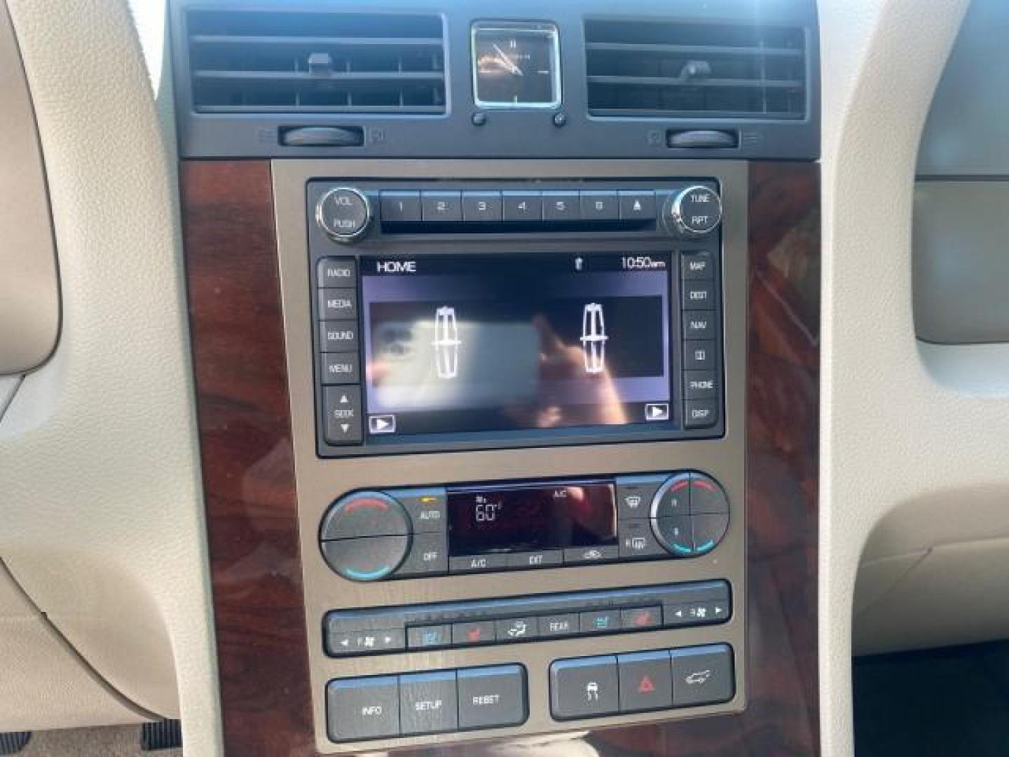 2011 Sterling Gray Metallic /Stone Lincoln Navigator 1 OWNER LOW MILES 53,320 (5LMJJ2H54BE) with an 5.4L SOHC 24-Valve V8 FFV Engine engine, Automatic transmission, located at 4701 North Dixie Hwy, Pompano Beach, FL, 33064, (954) 422-2889, 26.240938, -80.123474 - OUR WEBPAGE FLORIDACARS1.COM HAS OVER 100 PHOTOS AND FREE CARFAX LINK 2011 LINCOLN NAVIGATOR WE ADDED NEW FRONT ROTORS AND PADS VIN: 5LMJJ2H54BEJ04941 5 L M J J 2 H 5 4 B E J 0 4 9 4 1 4 DOOR WAGON/SPORT UTILITY 5.4L V8 F SOHC 24V FLEX FUEL REAR WHEEL DRIVE Top Features A/C Seat(s) Quad Seats Alloy - Photo#42