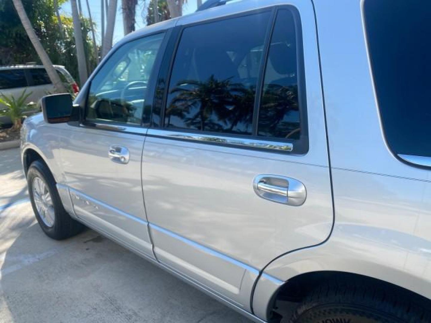 2011 Sterling Gray Metallic /Stone Lincoln Navigator 1 OWNER LOW MILES 53,320 (5LMJJ2H54BE) with an 5.4L SOHC 24-Valve V8 FFV Engine engine, Automatic transmission, located at 4701 North Dixie Hwy, Pompano Beach, FL, 33064, (954) 422-2889, 26.240938, -80.123474 - OUR WEBPAGE FLORIDACARS1.COM HAS OVER 100 PHOTOS AND FREE CARFAX LINK 2011 LINCOLN NAVIGATOR WE ADDED NEW FRONT ROTORS AND PADS VIN: 5LMJJ2H54BEJ04941 5 L M J J 2 H 5 4 B E J 0 4 9 4 1 4 DOOR WAGON/SPORT UTILITY 5.4L V8 F SOHC 24V FLEX FUEL REAR WHEEL DRIVE Top Features A/C Seat(s) Quad Seats Alloy - Photo#54