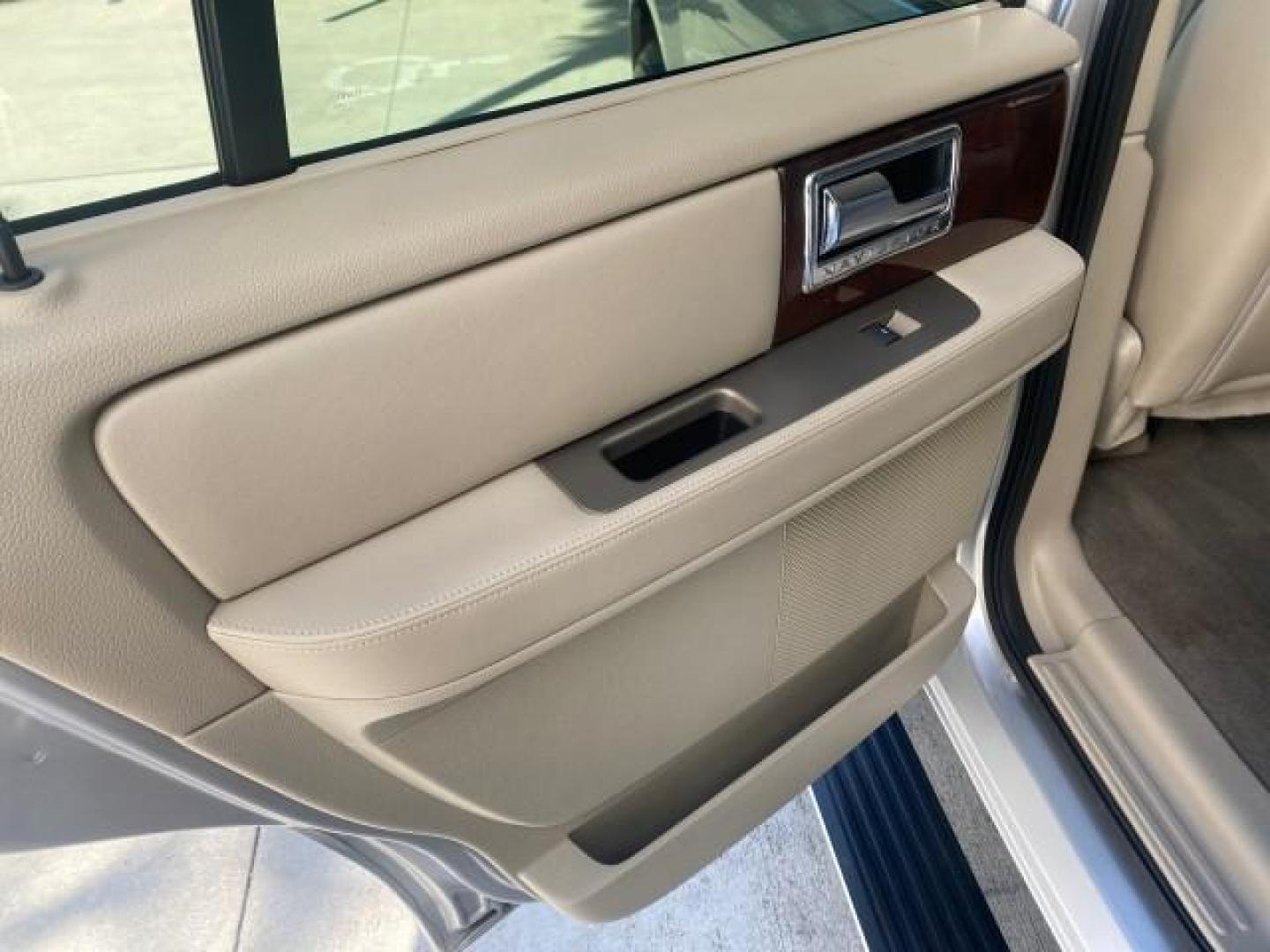 2011 Sterling Gray Metallic /Stone Lincoln Navigator 1 OWNER LOW MILES 53,320 (5LMJJ2H54BE) with an 5.4L SOHC 24-Valve V8 FFV Engine engine, Automatic transmission, located at 4701 North Dixie Hwy, Pompano Beach, FL, 33064, (954) 422-2889, 26.240938, -80.123474 - OUR WEBPAGE FLORIDACARS1.COM HAS OVER 100 PHOTOS AND FREE CARFAX LINK 2011 LINCOLN NAVIGATOR WE ADDED NEW FRONT ROTORS AND PADS VIN: 5LMJJ2H54BEJ04941 5 L M J J 2 H 5 4 B E J 0 4 9 4 1 4 DOOR WAGON/SPORT UTILITY 5.4L V8 F SOHC 24V FLEX FUEL REAR WHEEL DRIVE Top Features A/C Seat(s) Quad Seats Alloy - Photo#56