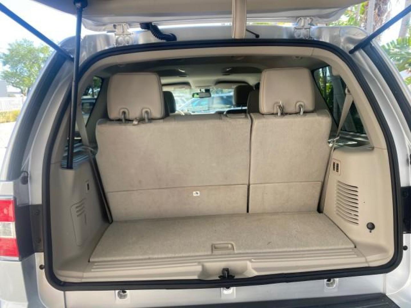 2011 Sterling Gray Metallic /Stone Lincoln Navigator 1 OWNER LOW MILES 53,320 (5LMJJ2H54BE) with an 5.4L SOHC 24-Valve V8 FFV Engine engine, Automatic transmission, located at 4701 North Dixie Hwy, Pompano Beach, FL, 33064, (954) 422-2889, 26.240938, -80.123474 - OUR WEBPAGE FLORIDACARS1.COM HAS OVER 100 PHOTOS AND FREE CARFAX LINK 2011 LINCOLN NAVIGATOR WE ADDED NEW FRONT ROTORS AND PADS VIN: 5LMJJ2H54BEJ04941 5 L M J J 2 H 5 4 B E J 0 4 9 4 1 4 DOOR WAGON/SPORT UTILITY 5.4L V8 F SOHC 24V FLEX FUEL REAR WHEEL DRIVE Top Features A/C Seat(s) Quad Seats Alloy - Photo#77