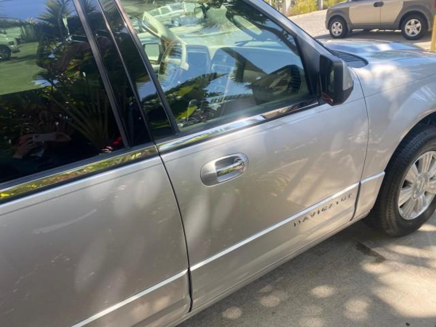 2011 Sterling Gray Metallic /Stone Lincoln Navigator 1 OWNER LOW MILES 53,320 (5LMJJ2H54BE) with an 5.4L SOHC 24-Valve V8 FFV Engine engine, Automatic transmission, located at 4701 North Dixie Hwy, Pompano Beach, FL, 33064, (954) 422-2889, 26.240938, -80.123474 - OUR WEBPAGE FLORIDACARS1.COM HAS OVER 100 PHOTOS AND FREE CARFAX LINK 2011 LINCOLN NAVIGATOR WE ADDED NEW FRONT ROTORS AND PADS VIN: 5LMJJ2H54BEJ04941 5 L M J J 2 H 5 4 B E J 0 4 9 4 1 4 DOOR WAGON/SPORT UTILITY 5.4L V8 F SOHC 24V FLEX FUEL REAR WHEEL DRIVE Top Features A/C Seat(s) Quad Seats Alloy - Photo#88