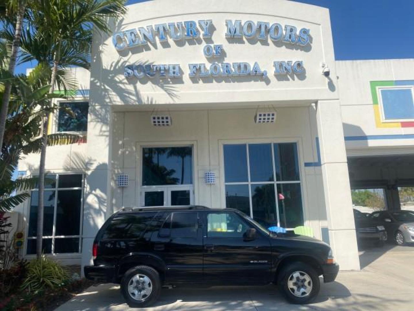 2002 Onyx Black /Medium Gray Chevrolet Blazer LS 4WD LOW MILES 35,402 (1GNDT13W62K) with an 4.3L Vortec 1000 SFI V6 Engine engine, Automatic transmission, located at 4701 North Dixie Hwy, Pompano Beach, FL, 33064, (954) 422-2889, 26.240938, -80.123474 - OUR WEBPAGE FLORIDACARS1.COM HAS OVER 100 PHOTOS AND FREE CARFAX LINK 2002 CHEVROLET BLAZER LS VIN: 1GNDT13W62K130832 1 G N D T 1 3 W 6 2 K 1 3 0 8 3 2 4 DOOR WAGON/SPORT UTILITY 4.3L V6 F OHV 12V GASOLINE REAR WHEEL DRIVE W/ 4X4 Top Features 4WD/AWD Cloth Seats Alloy Wheels Tow Hitch Basic Features - Photo#0