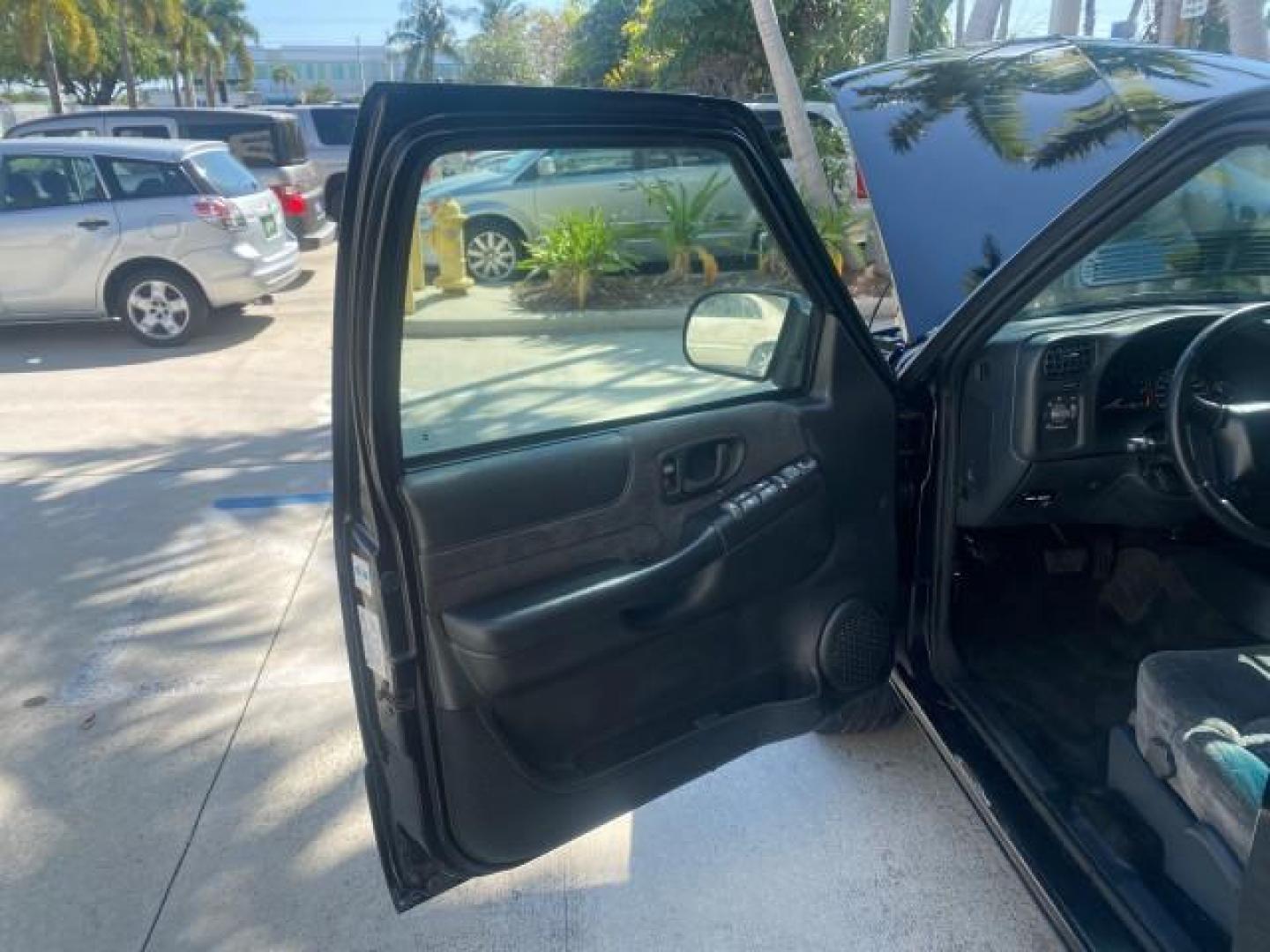 2002 Onyx Black /Medium Gray Chevrolet Blazer LS 4WD LOW MILES 35,402 (1GNDT13W62K) with an 4.3L Vortec 1000 SFI V6 Engine engine, Automatic transmission, located at 4701 North Dixie Hwy, Pompano Beach, FL, 33064, (954) 422-2889, 26.240938, -80.123474 - OUR WEBPAGE FLORIDACARS1.COM HAS OVER 100 PHOTOS AND FREE CARFAX LINK 2002 CHEVROLET BLAZER LS VIN: 1GNDT13W62K130832 1 G N D T 1 3 W 6 2 K 1 3 0 8 3 2 4 DOOR WAGON/SPORT UTILITY 4.3L V6 F OHV 12V GASOLINE REAR WHEEL DRIVE W/ 4X4 Top Features 4WD/AWD Cloth Seats Alloy Wheels Tow Hitch Basic Features - Photo#9